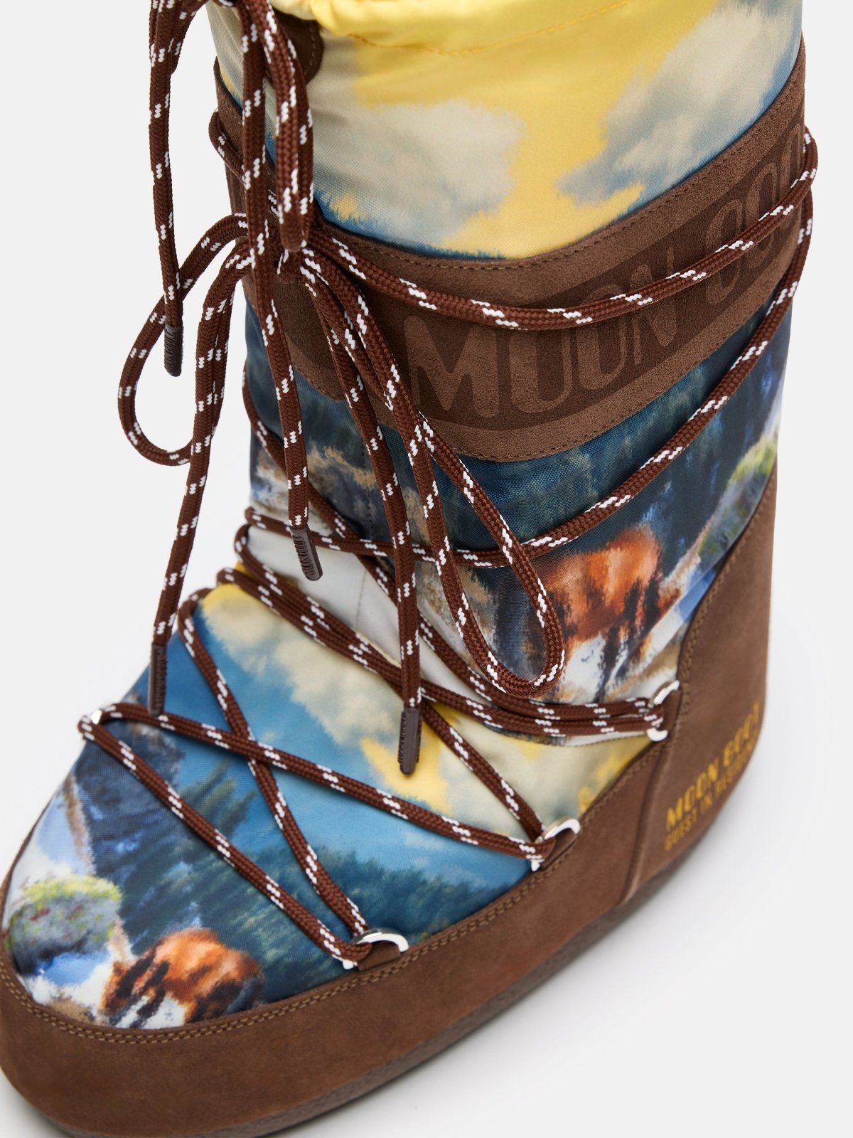 Close-up of MB X GIR ICON HIGH POSTCARD winter boot with colorful nature print and brown laces and trim