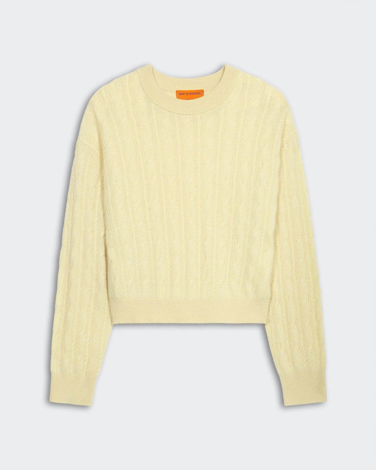 Cable Collegiate Crew - Butter lightweight cashmere sweater with cable knit and ribbed cuffs, hem, and neck trim.