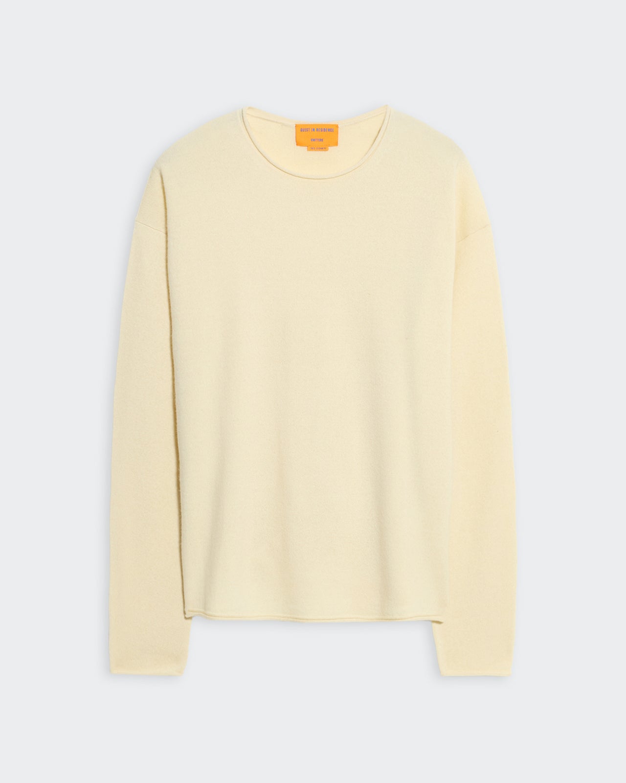 Lightweight oversized cream crew neck sweater with dropped shoulders and curved shirttail hem for men and women