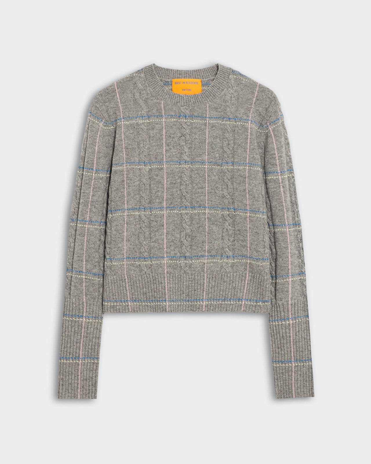 Heather grey shrunken crew neck sweater with cable stitch and four-color check pattern in lightweight cashmere.