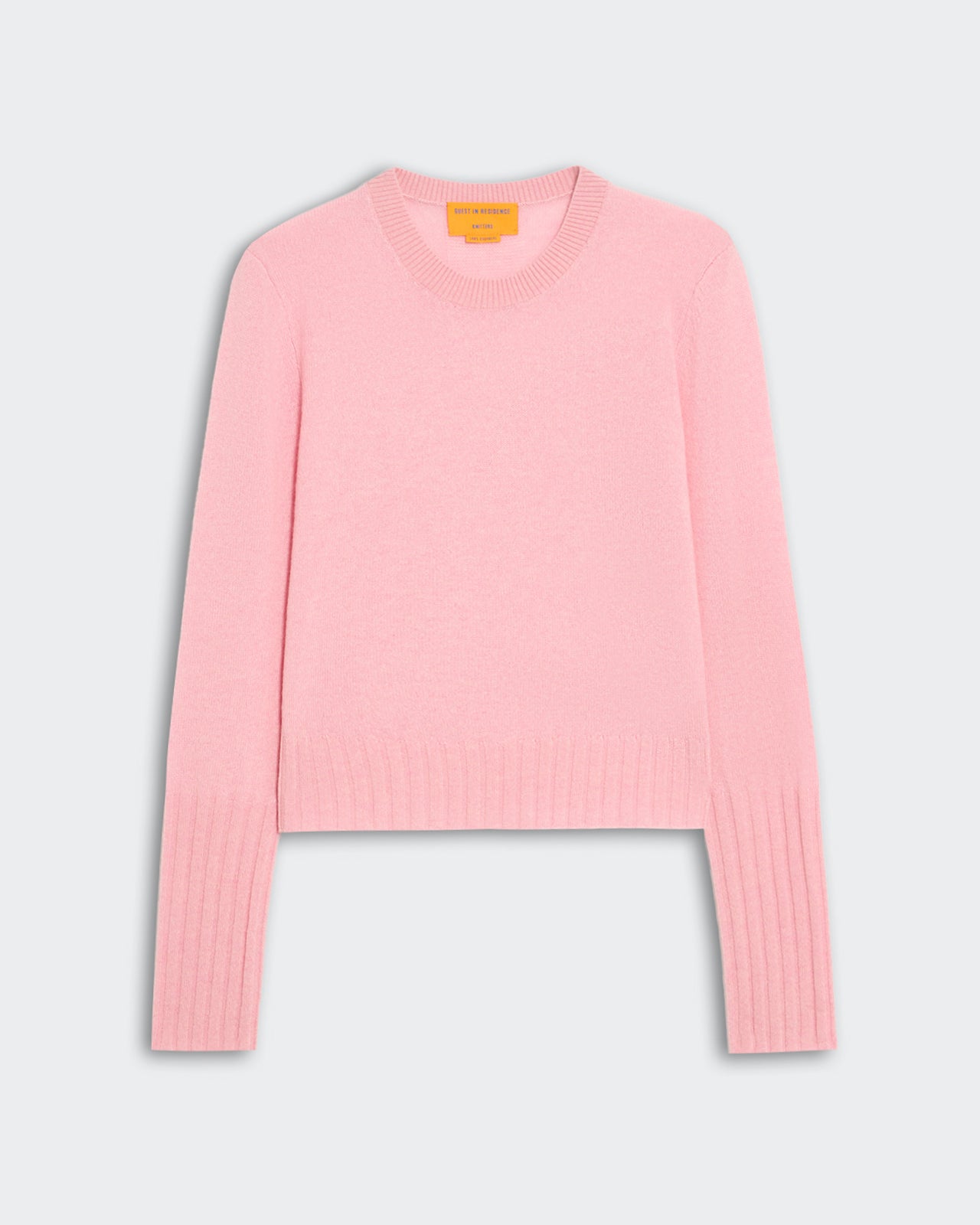 Slim fit women's light pink cashmere sweater with high rib sleeve cuffs and rib trim hem, signature GIR branding back