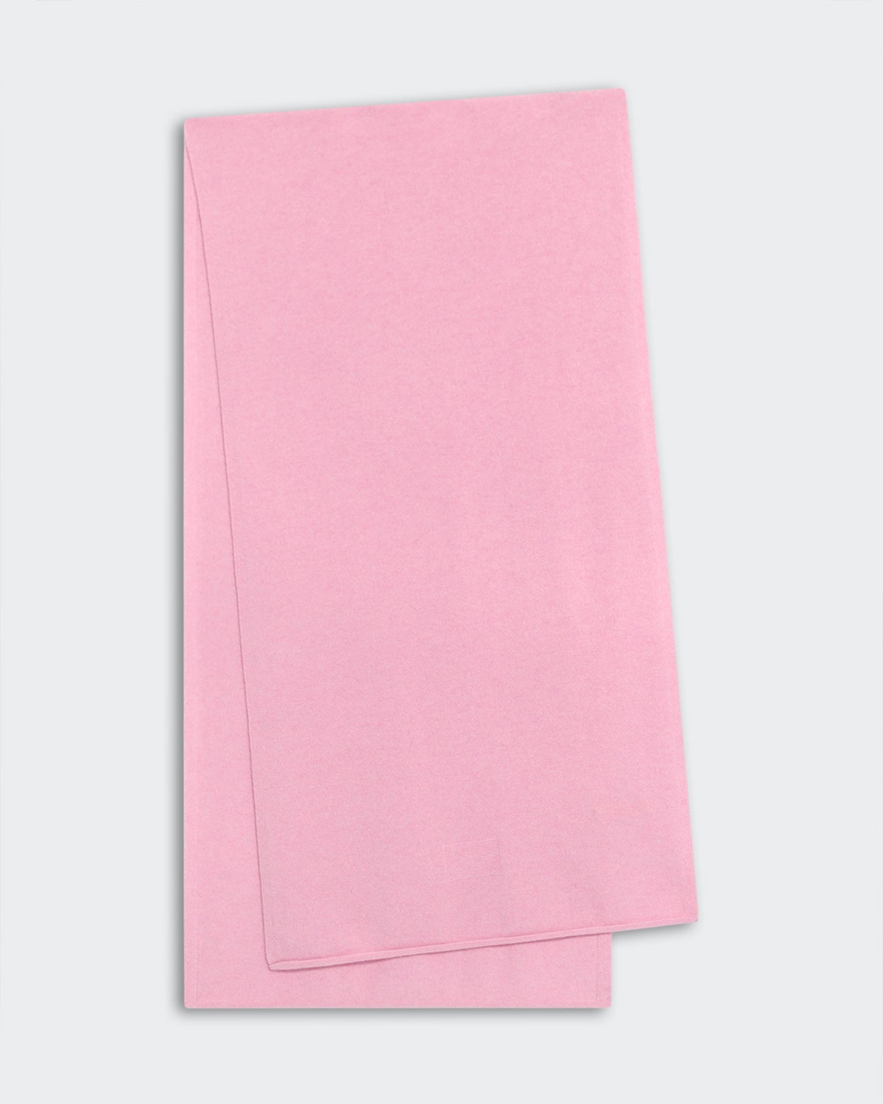 Light-weight pink cashmere scarf with jersey roll hem, measuring 74 by 19 inches, made from 100% premium inner Mongolian cashmere.