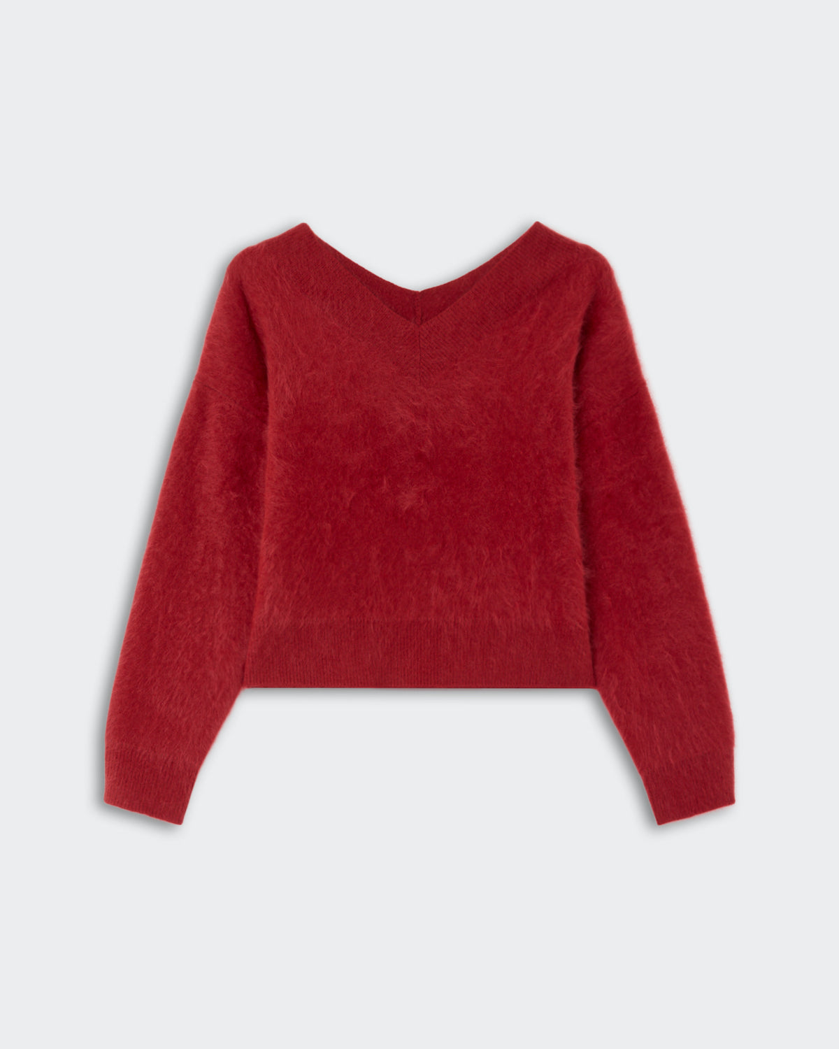 Grizzly Double V - Carmine red soft cashmere sweater with long sleeves and a V-neck collar on a light background.