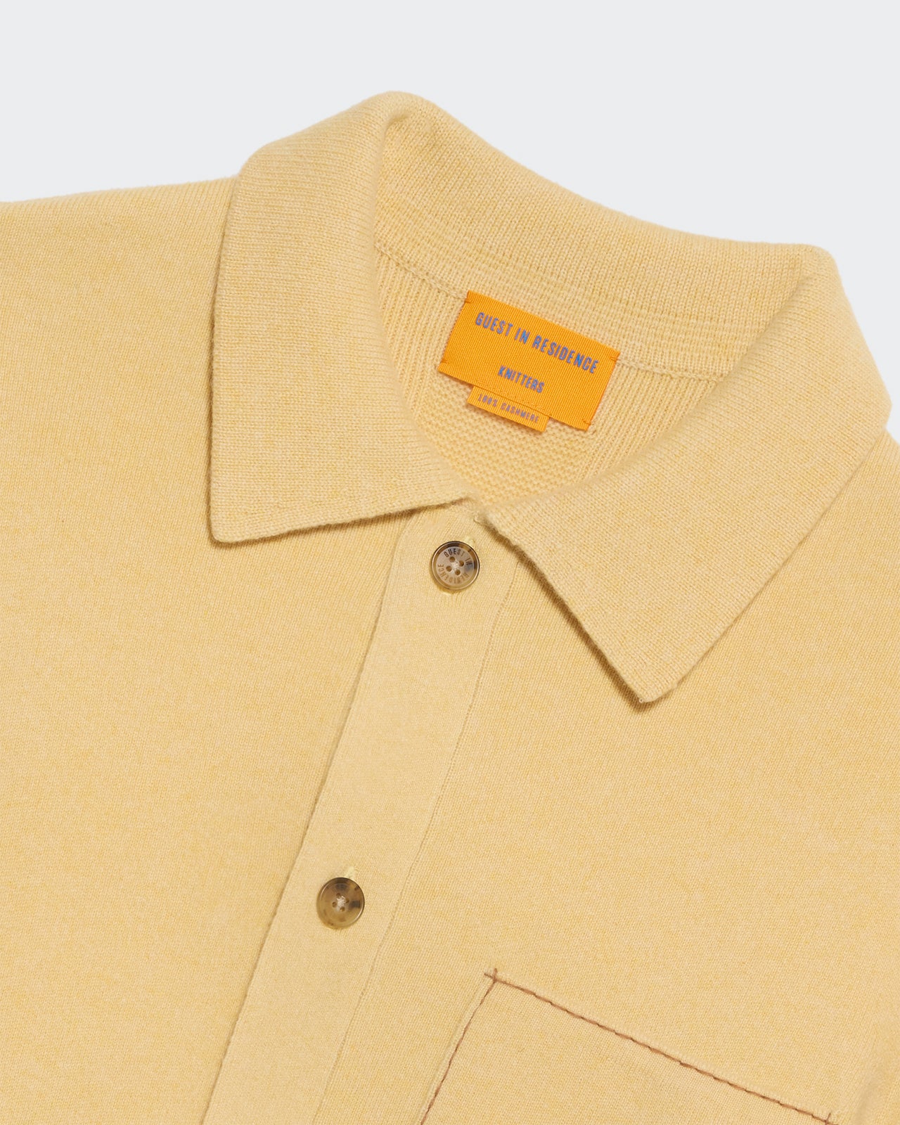 Industry Jacket Butter Almond with shirt collar button closure and contrast hand topstitching on pocket and cuff