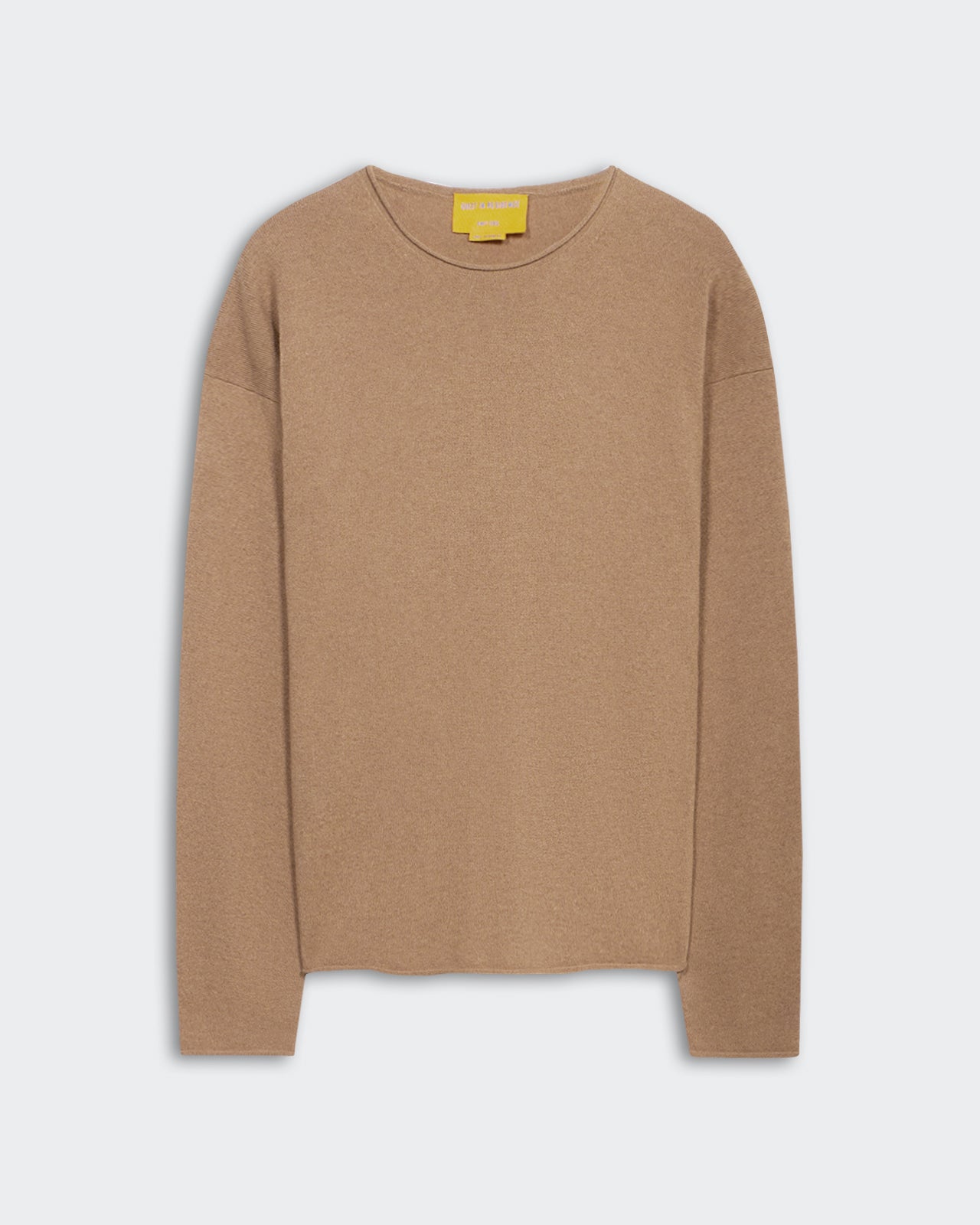 Oversized Crew Almond in light-weight 100% cashmere with crew neck and dropped shoulder design in almond color.