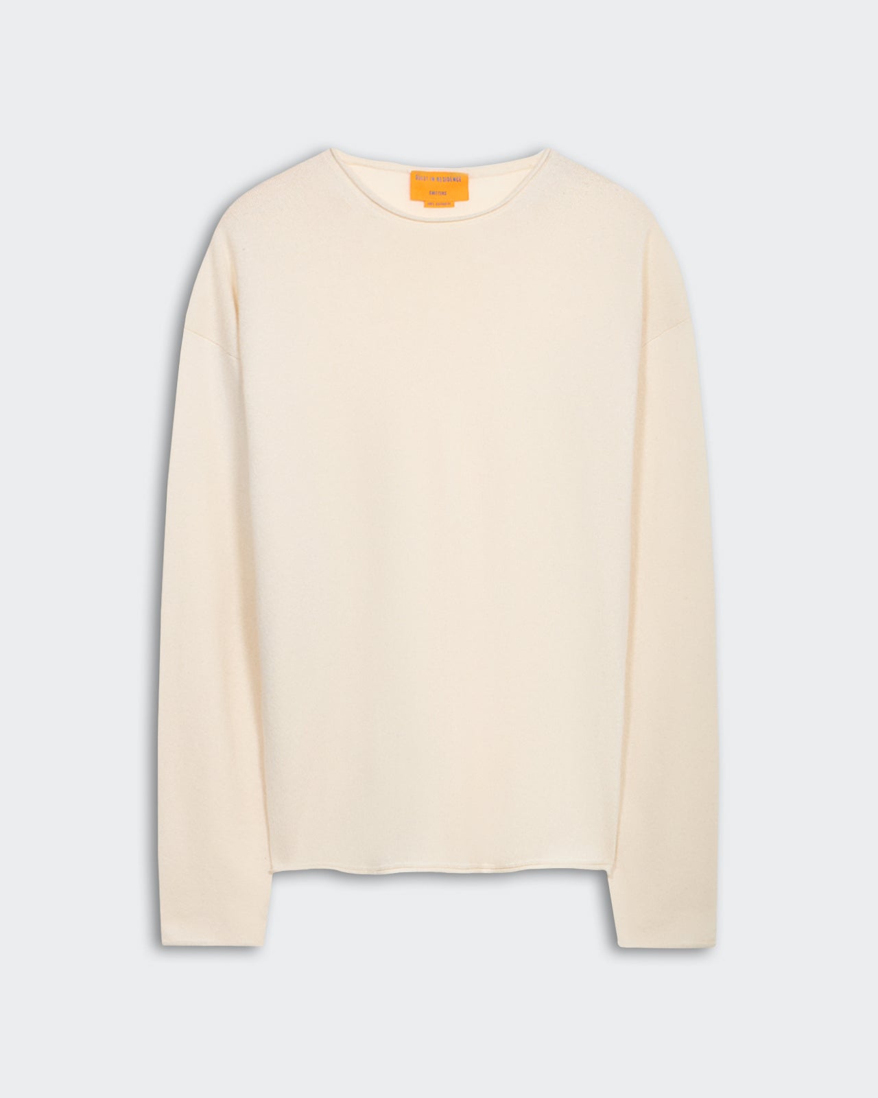 Oversized Crew - Cream light-weight premium cashmere crew neck sweater with dropped shoulder and shirttail curved hem.