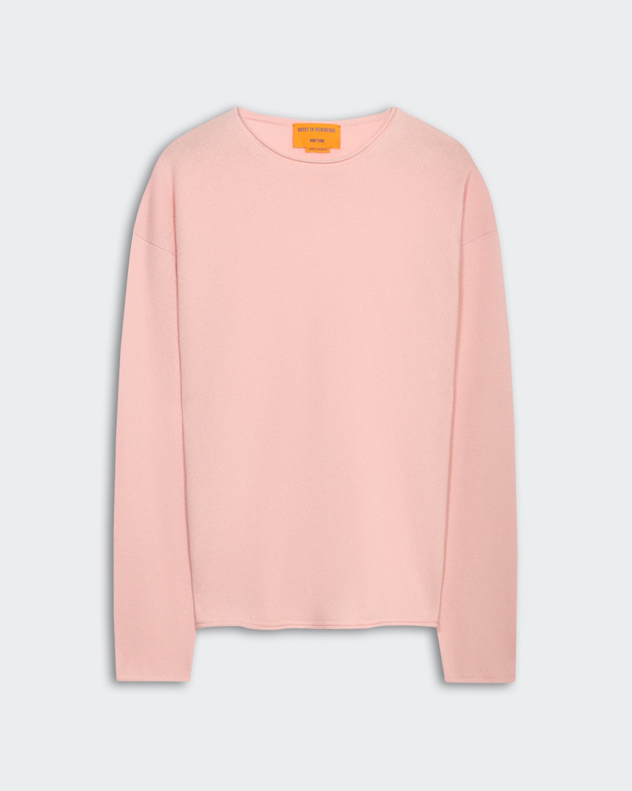 Oversized Crew - Powder Pink light-weight cashmere crew neck sweater with dropped shoulder and curved shirttail hem.