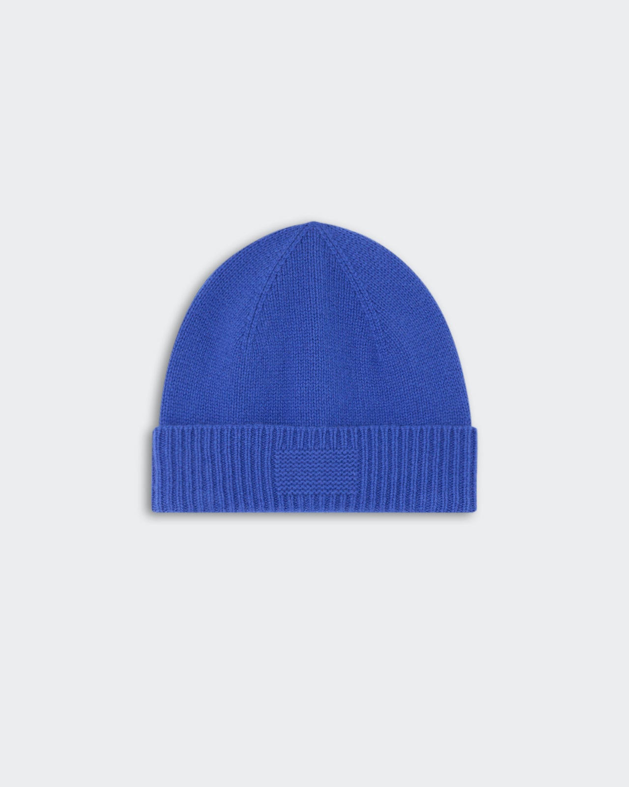Rib Cuff Beanie - Reservoir in vibrant blue with a thick ribbed cuff and soft knit texture designed for warmth and style.