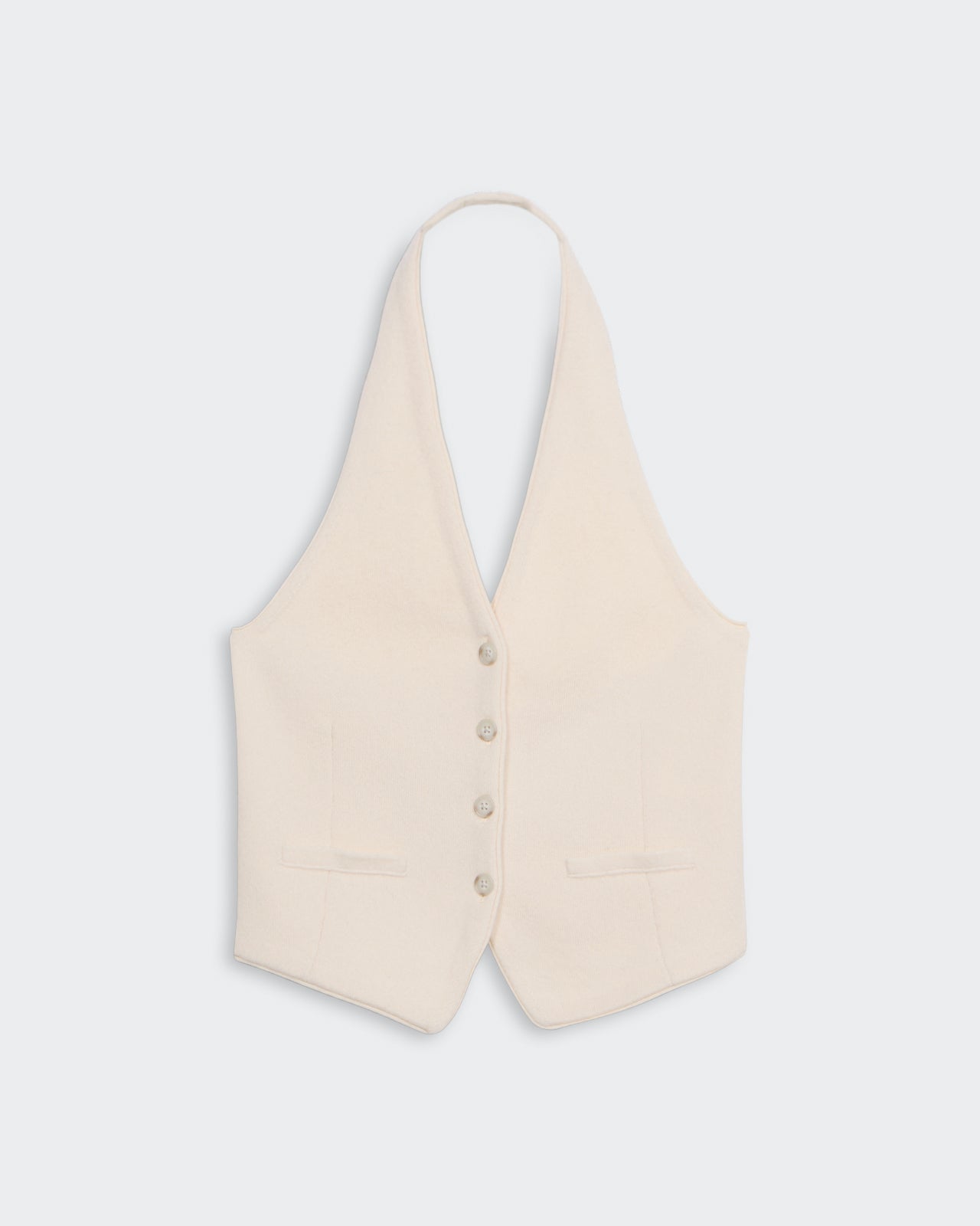 Tailored Halter Vest - Cream in cashmere with front buttons, contoured darts, faux pockets, and adjustable back buckle strap.