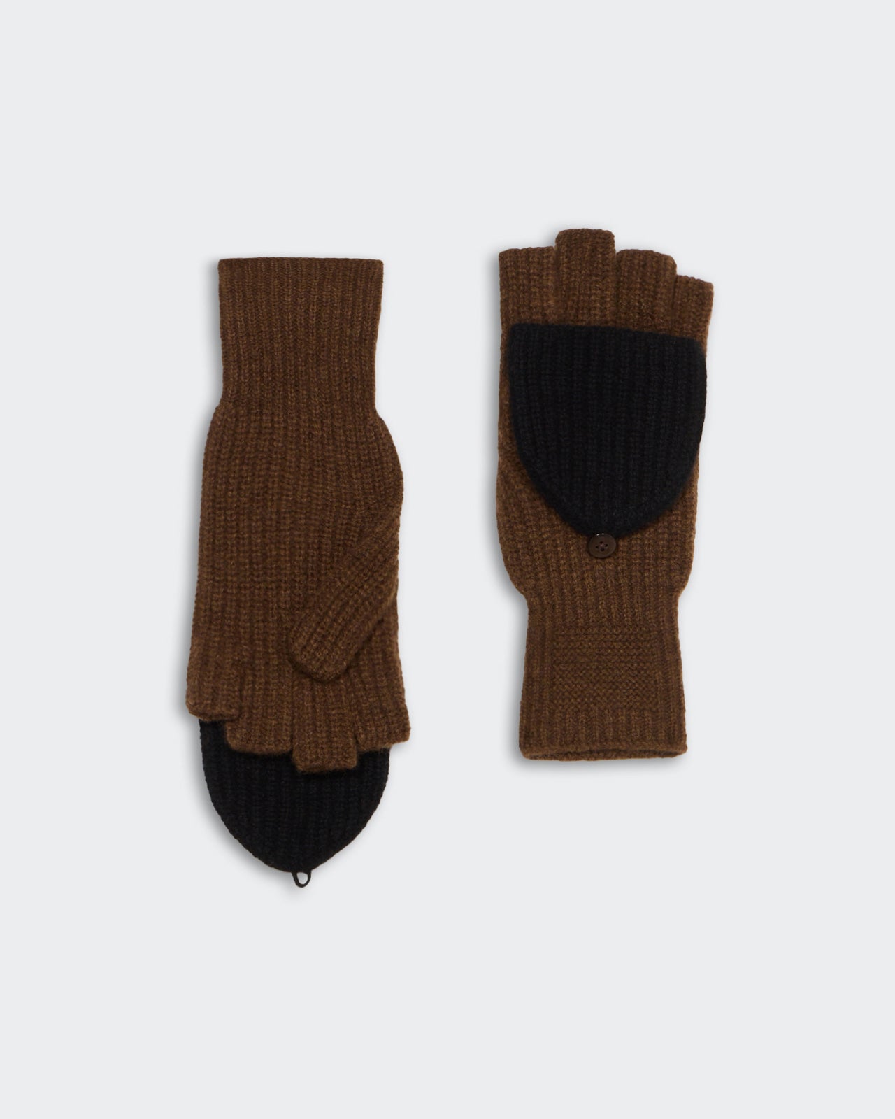 Chestnut and black mid-weight cashmere mitts with finger flap and button closure laid flat on gray background