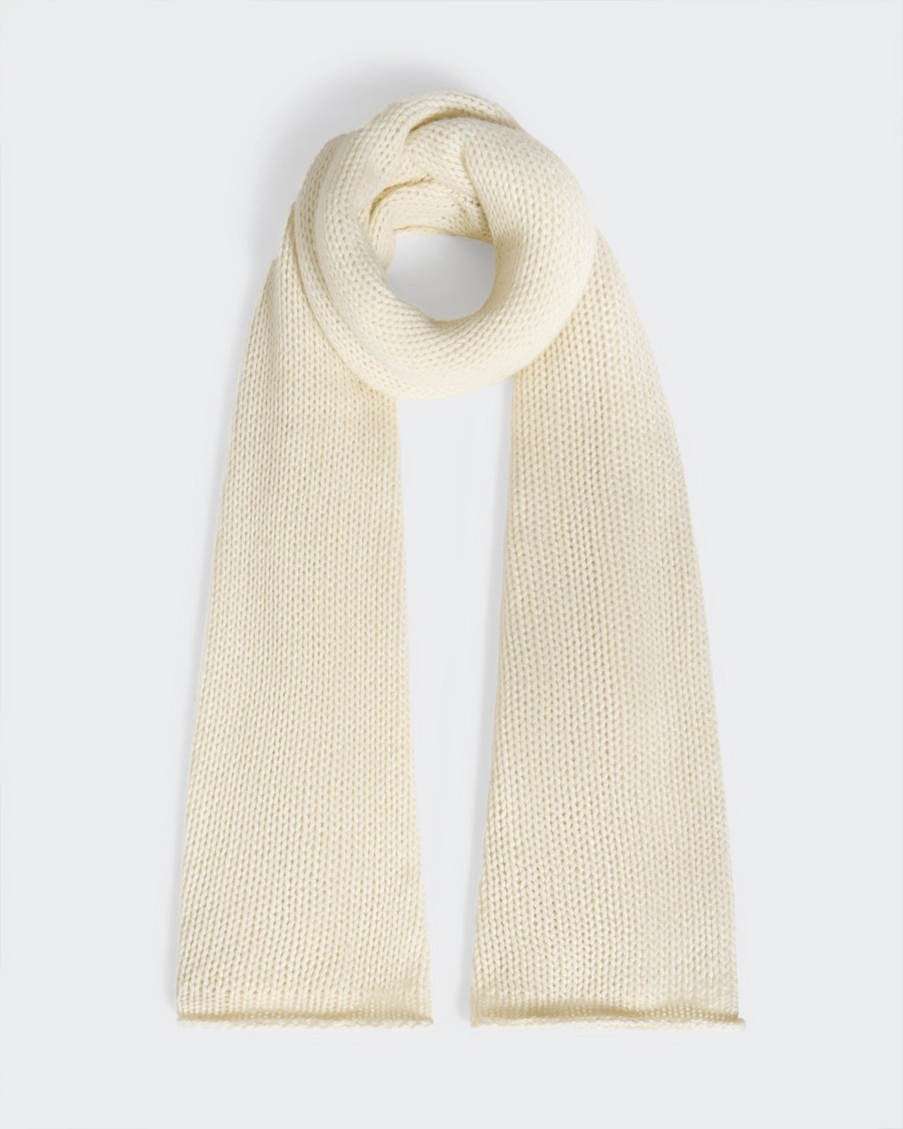 The Blanket Scarf - Cream, 72"x19" open knit jersey, chunky 100% cashmere scarf with GIR branding.