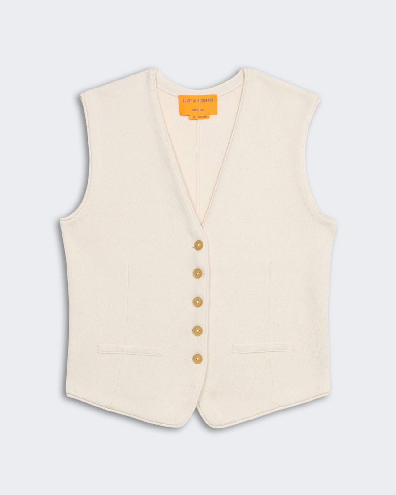 Tailored Vest - Cream women's fitted 100% cashmere vest with front buttons, contour darts, and faux pockets.