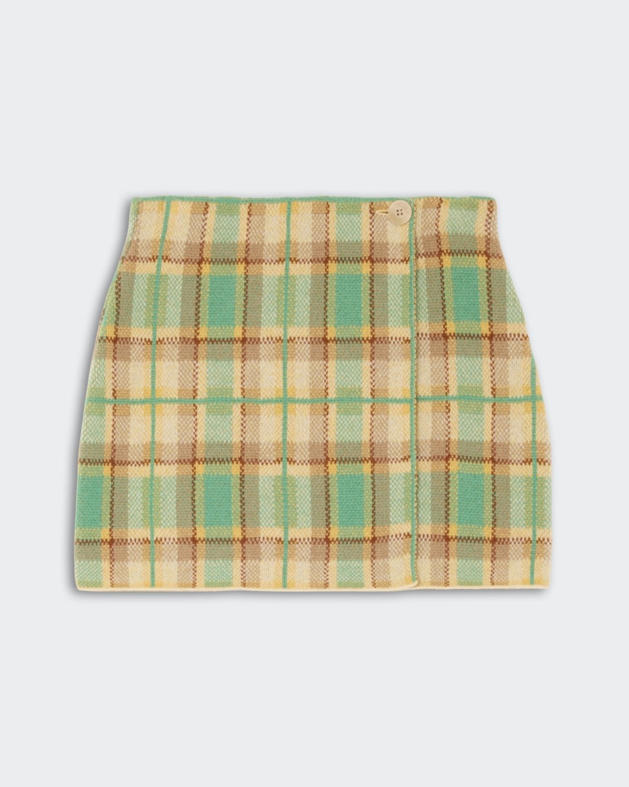 Tartan Mini Skirt - Highland Combo in pastel green, beige, and yellow plaid pattern featuring a wrap style with a button closure on the waist.