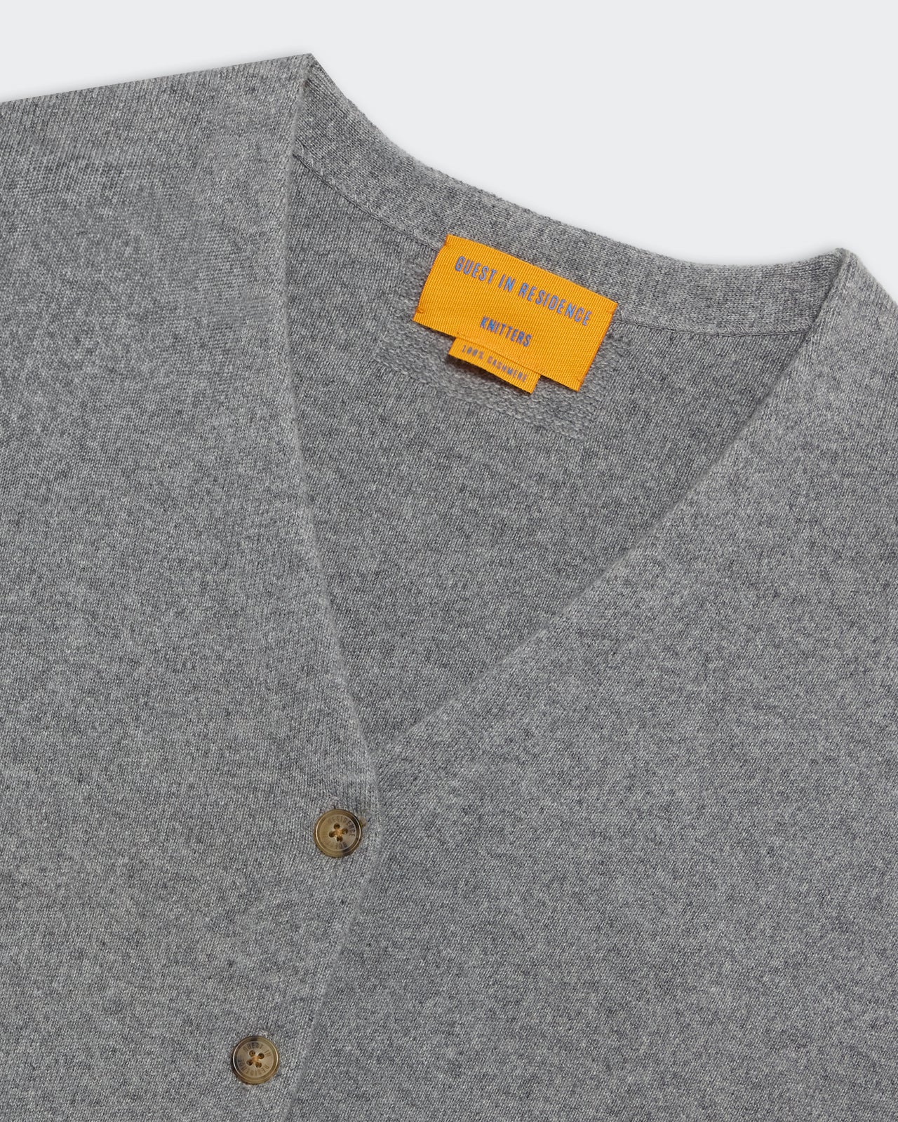 Collegiate Cardigan - Heather Grey close-up of V-neck cashmere knit with buttons and ribbed trim