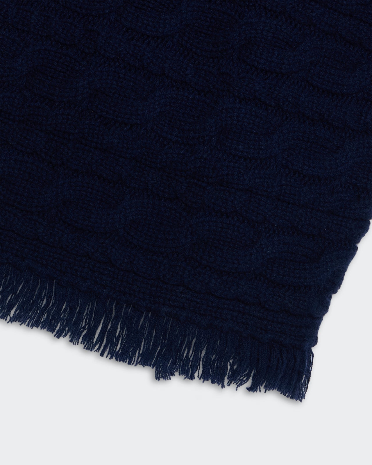 Cropped Cable Turtleneck - Midnight with heavy-weight wool cashmere blend, horizontal cable knit and fringe hem detail.