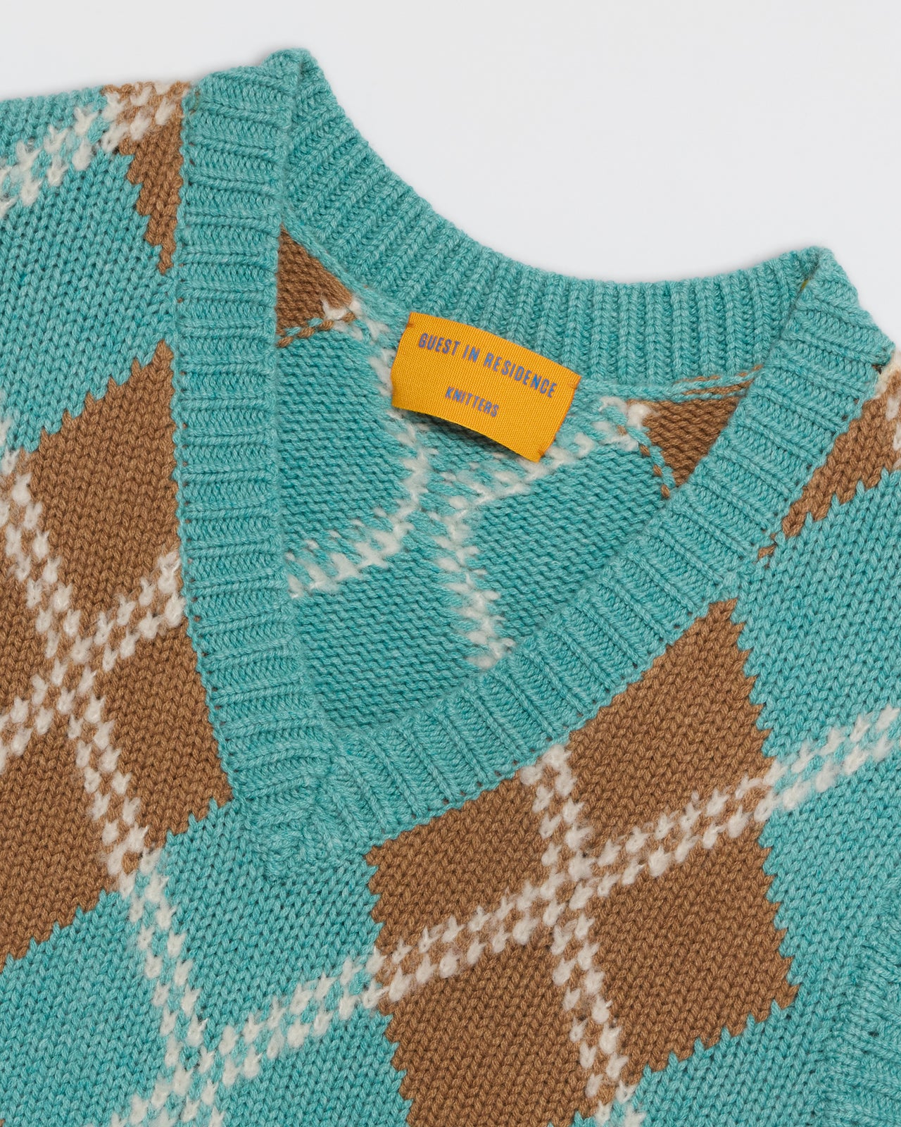 Argyle Vest - Glacier Combo with V-neck and turquoise, brown, and white argyle pattern knit design close-up.