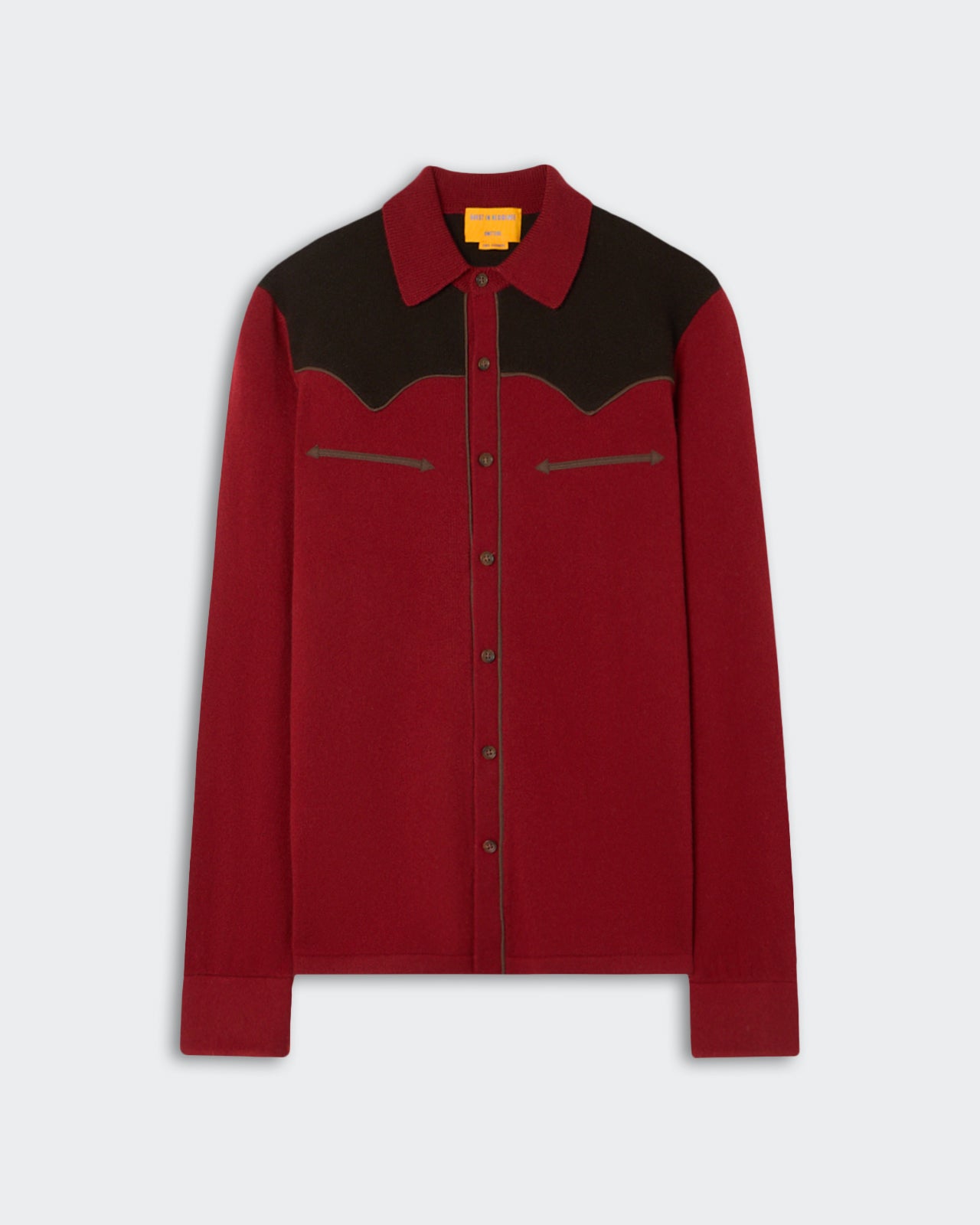 Long-sleeve button-up shirt in deep red with a contrasting dark brown yoke and collar, featuring two arrow-shaped decorative details on the chest area.