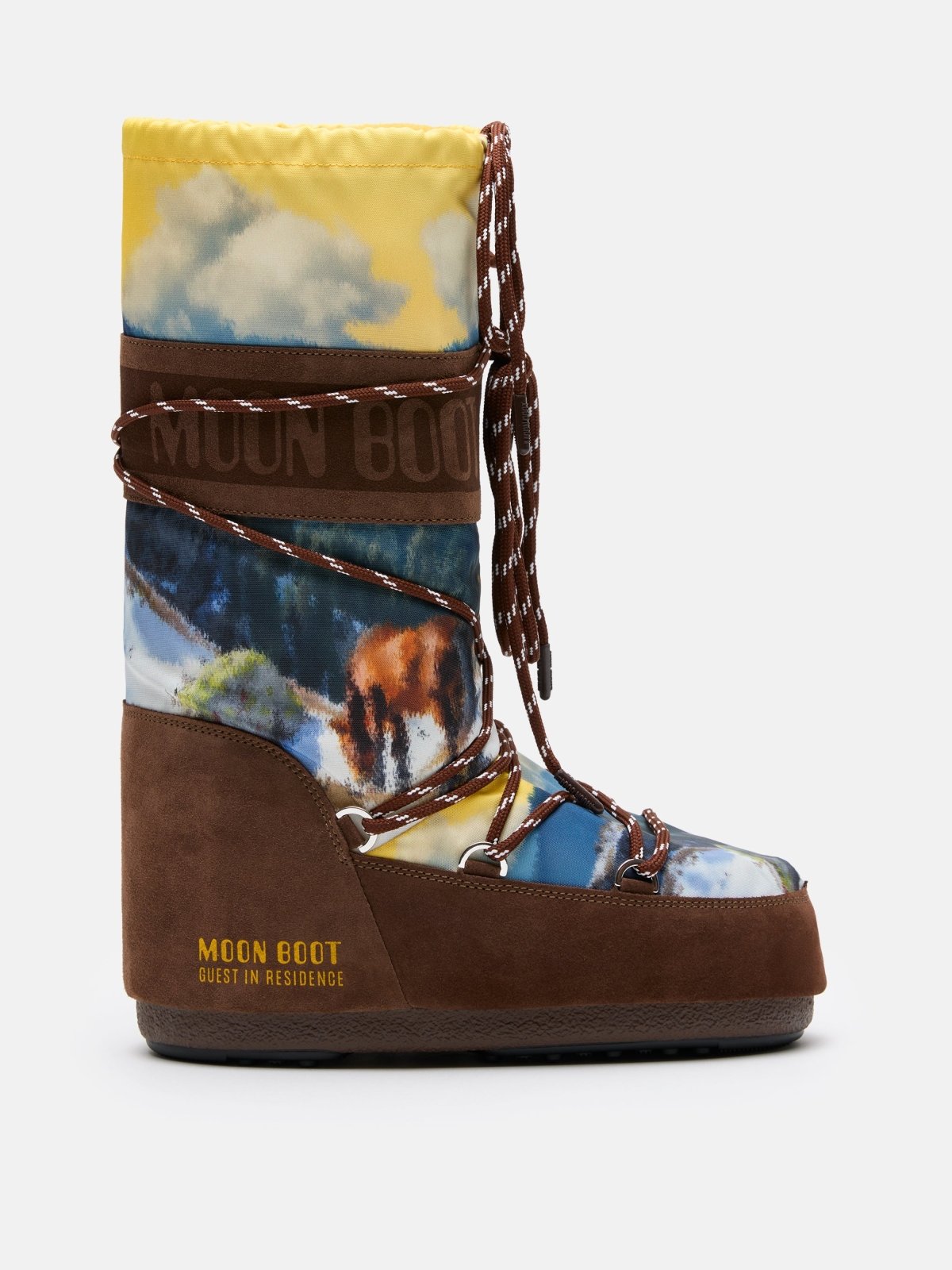 Brown and multicolor Moon Boot with high ankle design and landscape print featuring clouds and nature scene