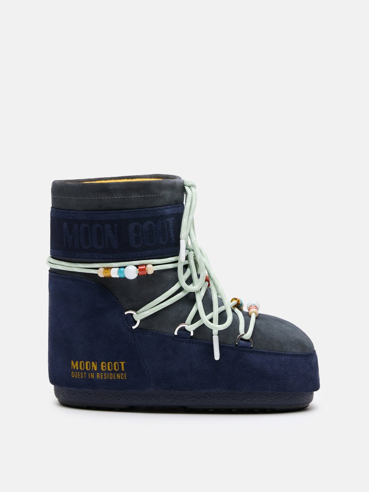 Side view of MB X GIR ICON LOW suede winter boot with decorative beads and laces in navy blue color