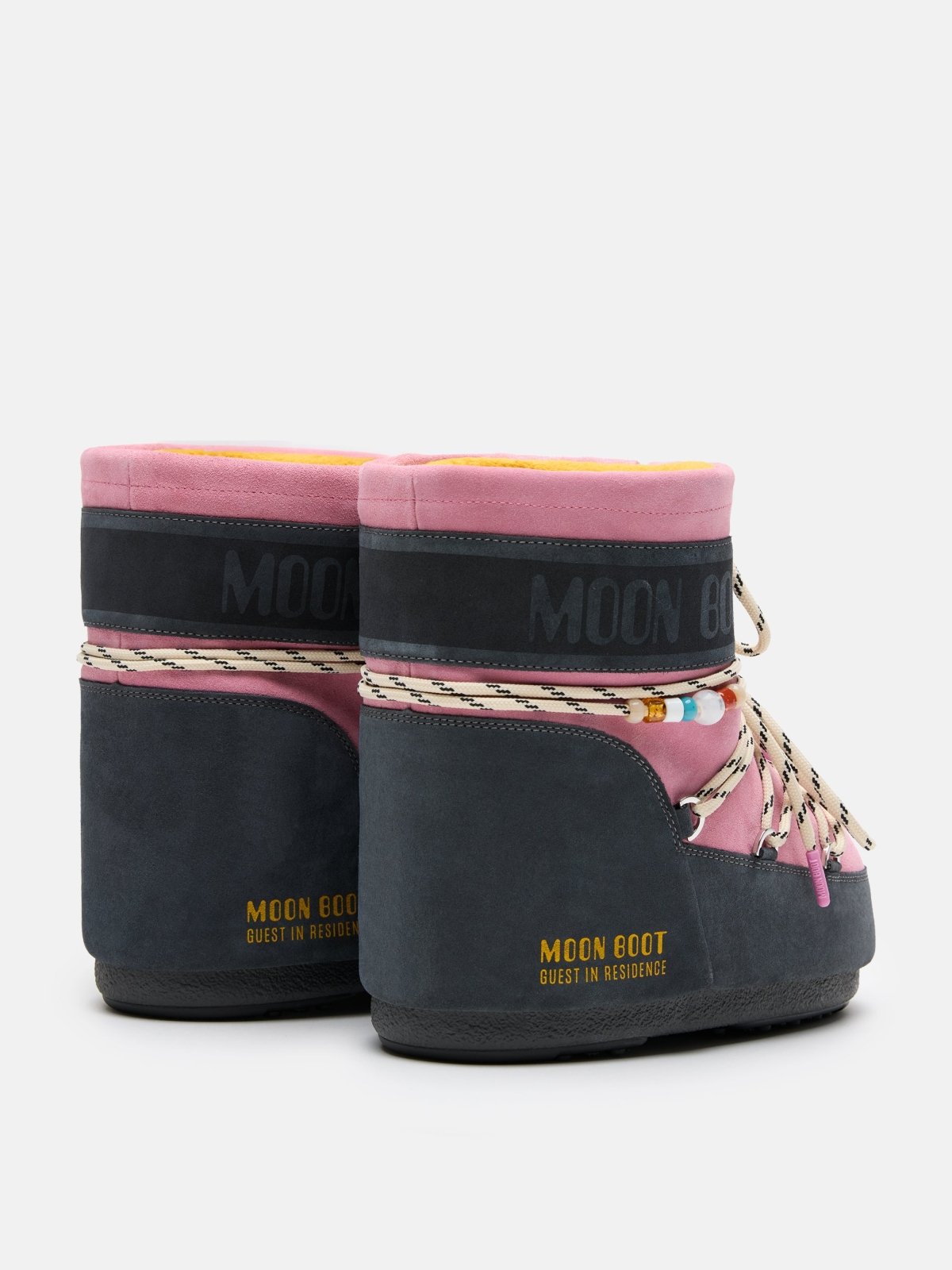 Grey and rose suede MB X GIR Icon low boots with beaded laces and Moon Boot branding on the heel side
