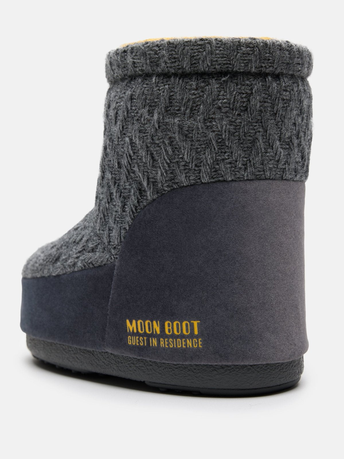 Rear view of gray MB X GIR ICON LOW NOLACE KNIT Moon Boot with knit upper and rubber sole detail