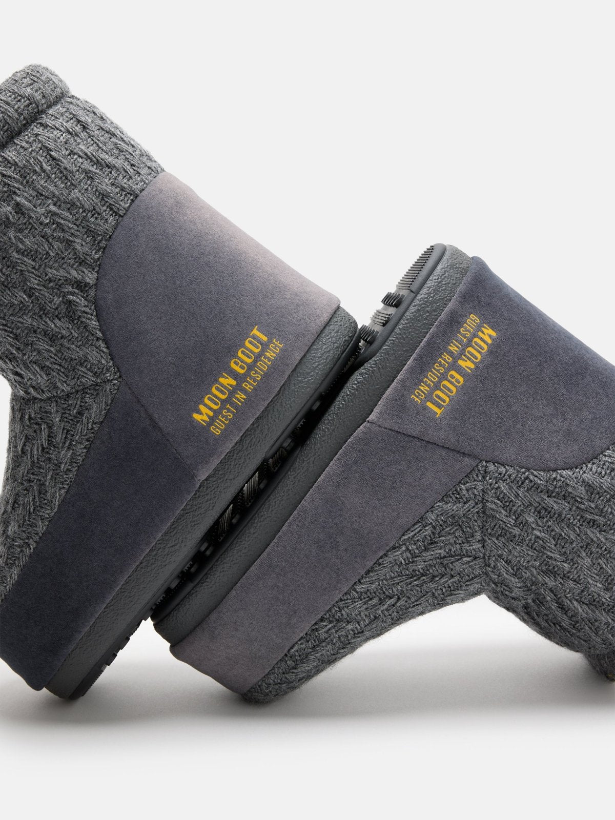 Pair of gray knit and suede MB X GIR ICON LOW NOLACE KNIT Moon Boots with yellow branding detail
