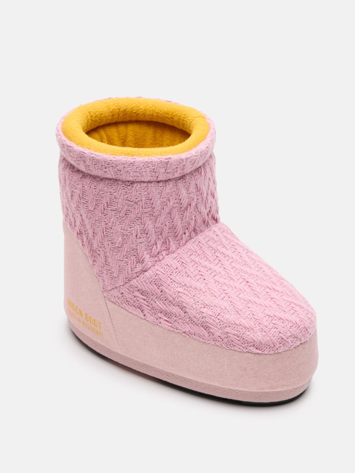 Pink MB X GIR ICON LOW NOLACE KNIT slipper boot with textured knit upper and yellow fleece lining on a white background