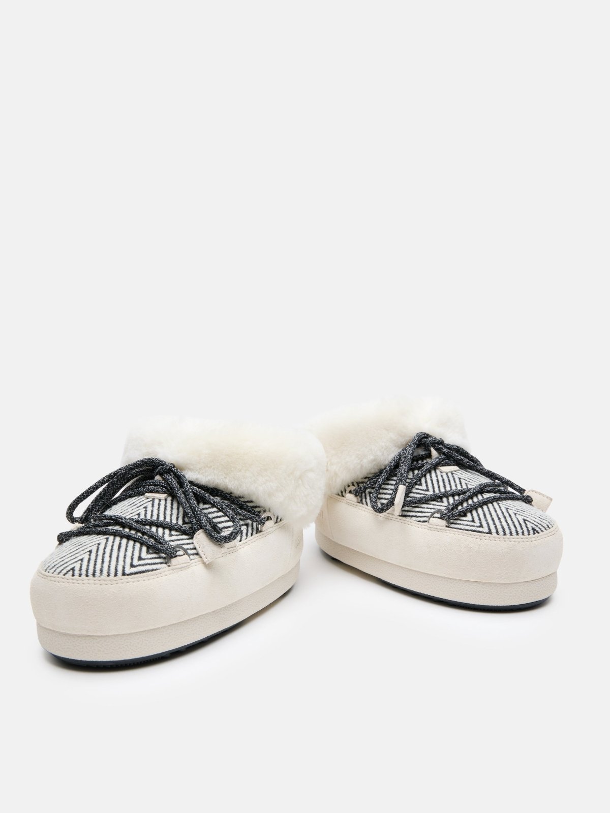 Pair of MB X GIR EVX Chalet Mules with fur lining and patterned fabric upper, comfortable thick sole slippers