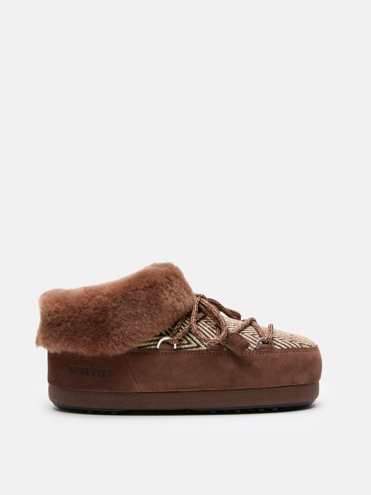 Brown MB X GIR EVX Chalet Mule Fur slipper with patterned fabric, thick sole, and plush fur lining on a white background