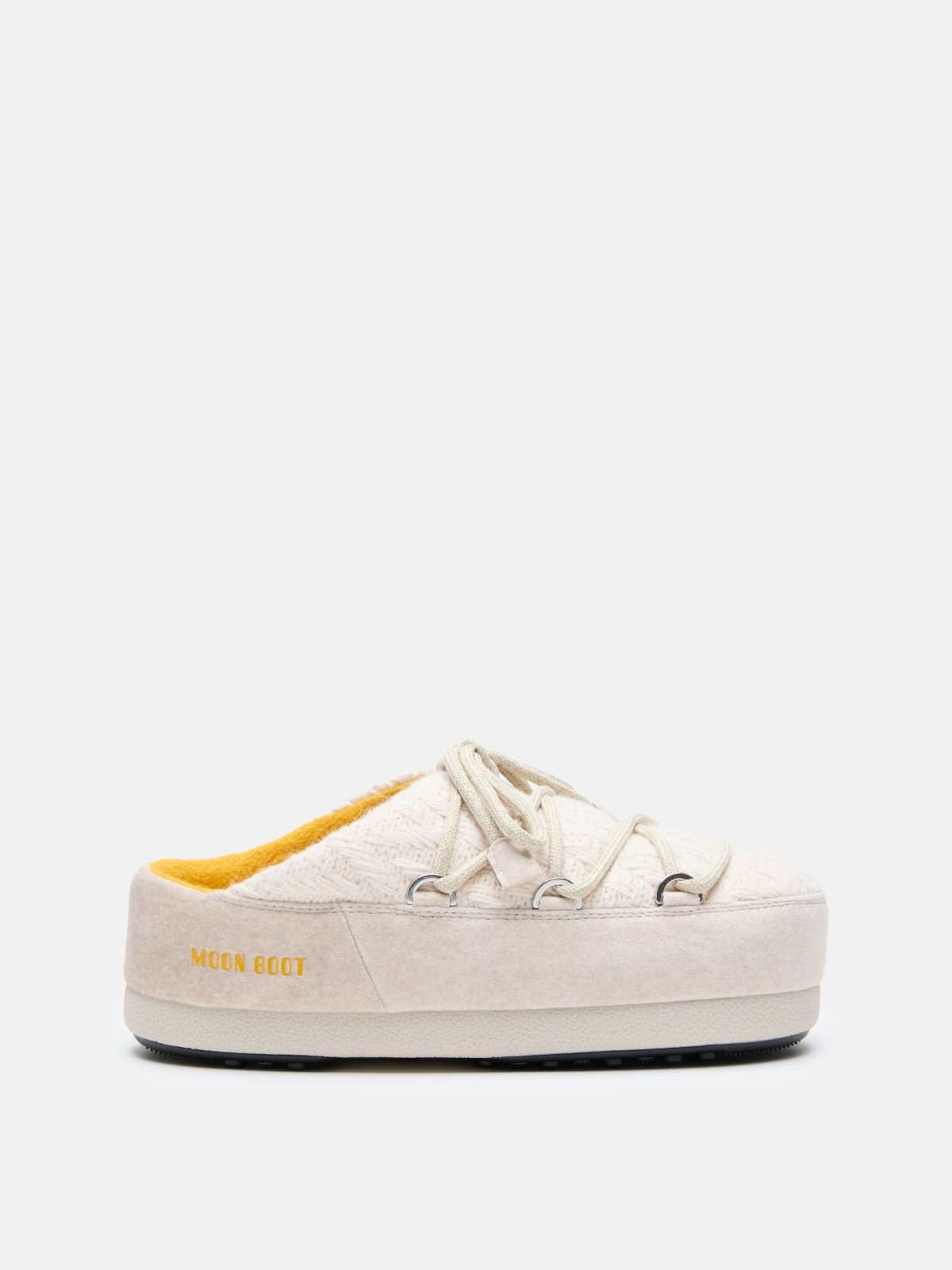 Side view of MB X GIR EVX MULE KNIT slip-on shoe in cream with yellow lining and lace-up detail