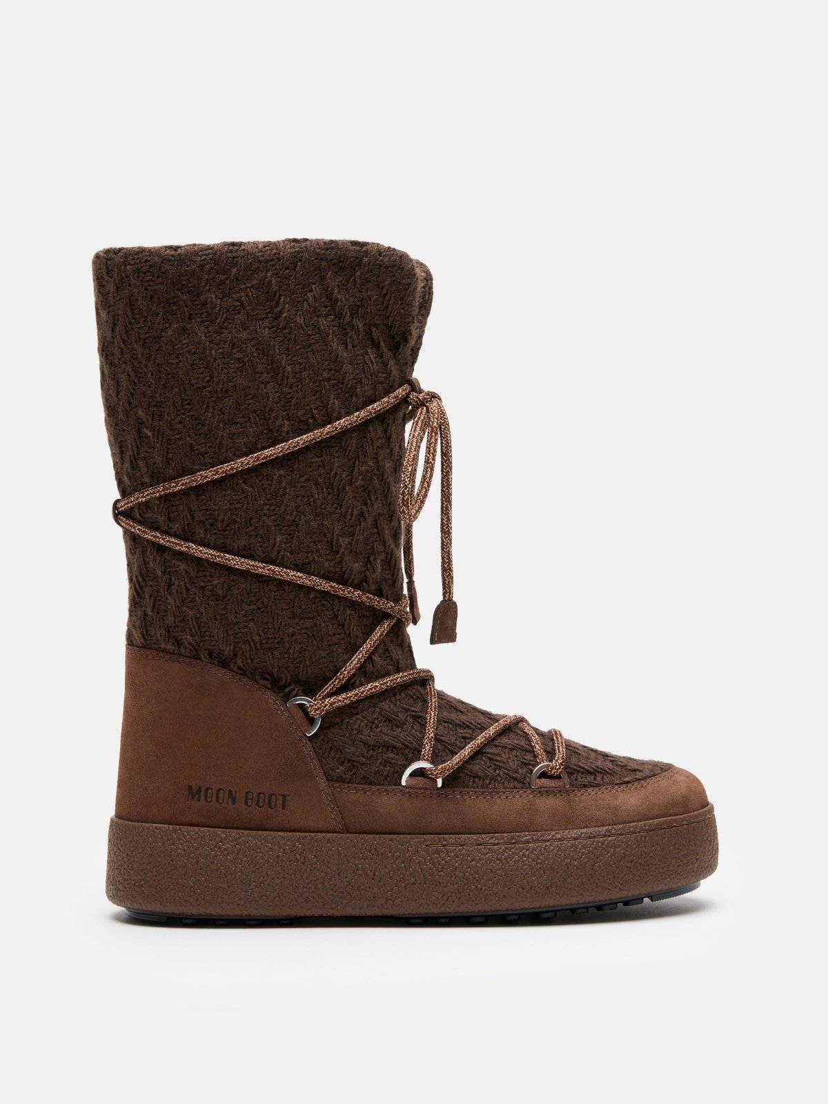 Brown MB X GIR LTRACK KNIT winter boot with textured knit upper and lace-up design on white background