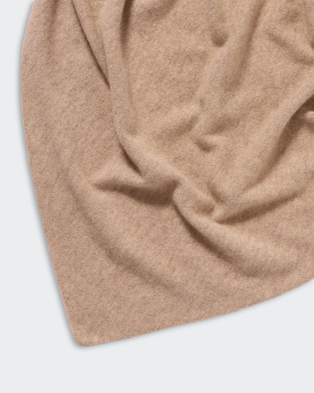 The Bandana - Taupe light-weight cashmere jersey knit with soft texture and natural folds displayed on a flat surface.