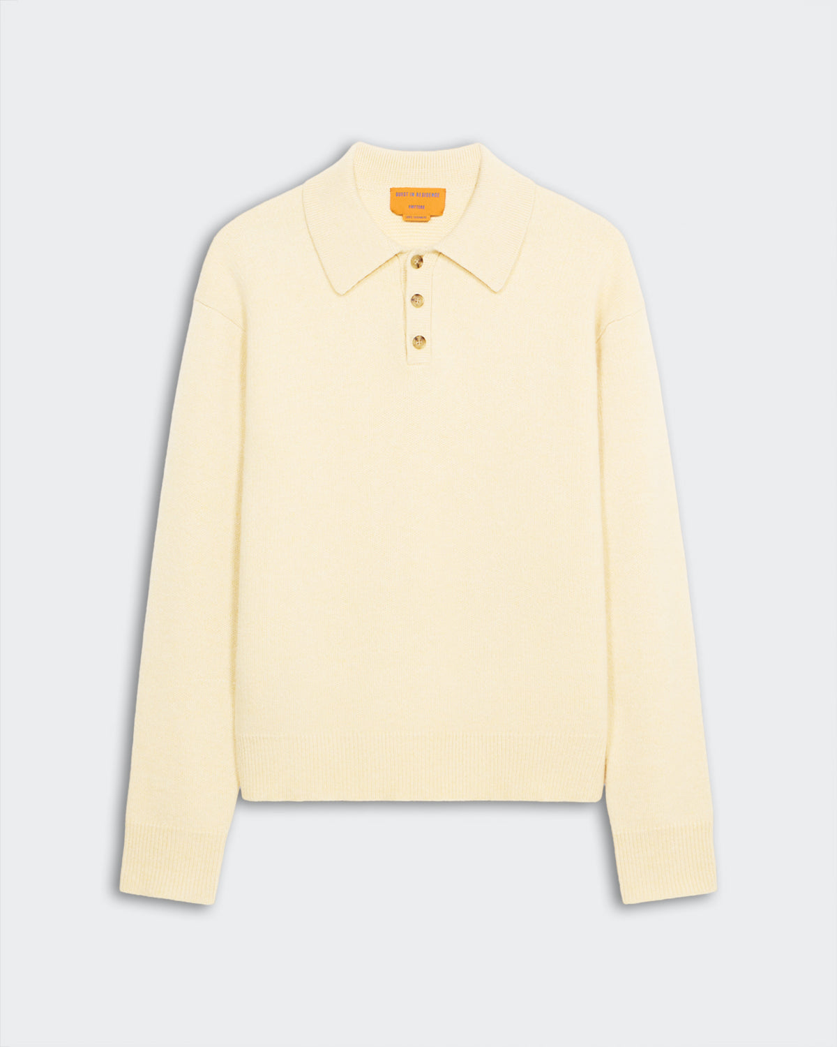 Allday Polo - Butter men’s ribbed collar and cuff cashmere polo with three-button placket in cream color.