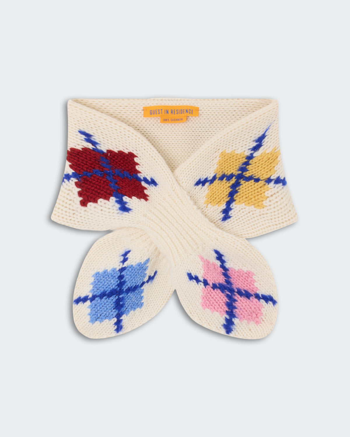Argyle Bowtie Scarf - Cream Combo featuring a knit cream base with colorful argyle patterns in red, yellow, blue, and pink, made from soft cashmere material.