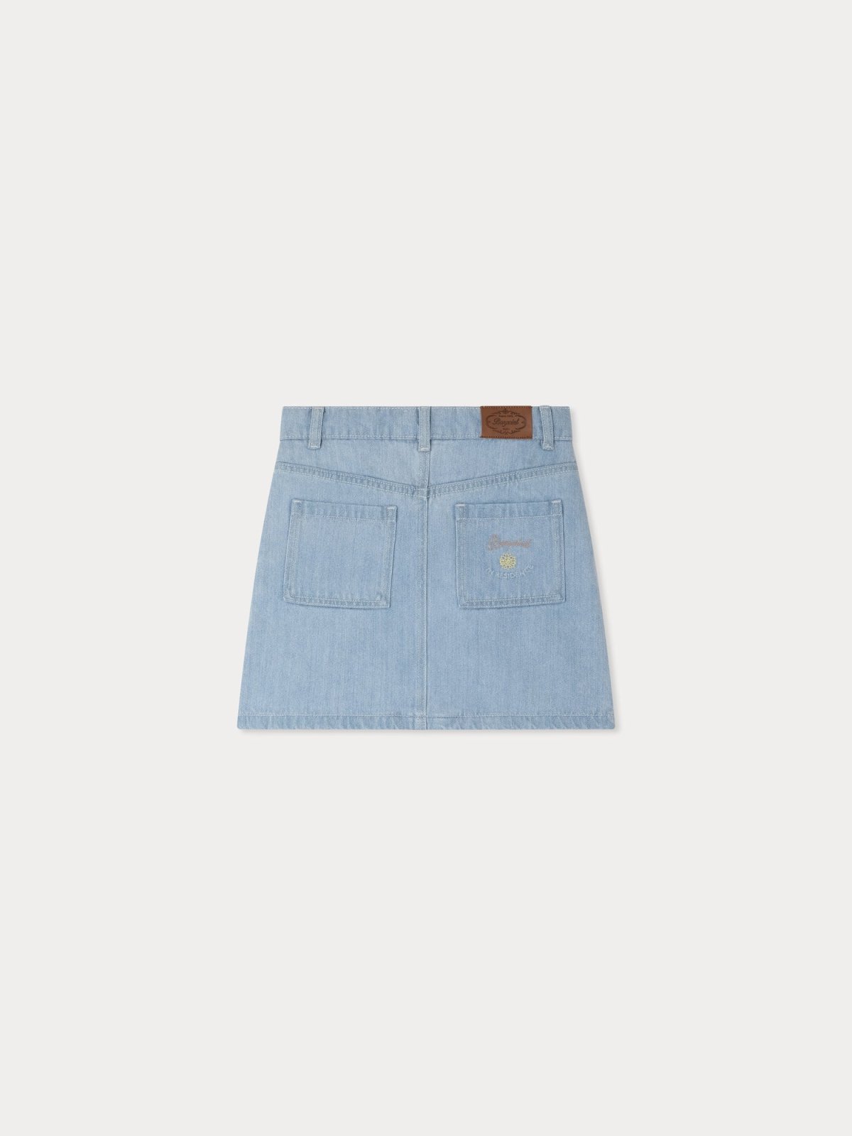 Light blue cotton denim skirt with adjustable waist and patch pockets, made using water-saving washing technique