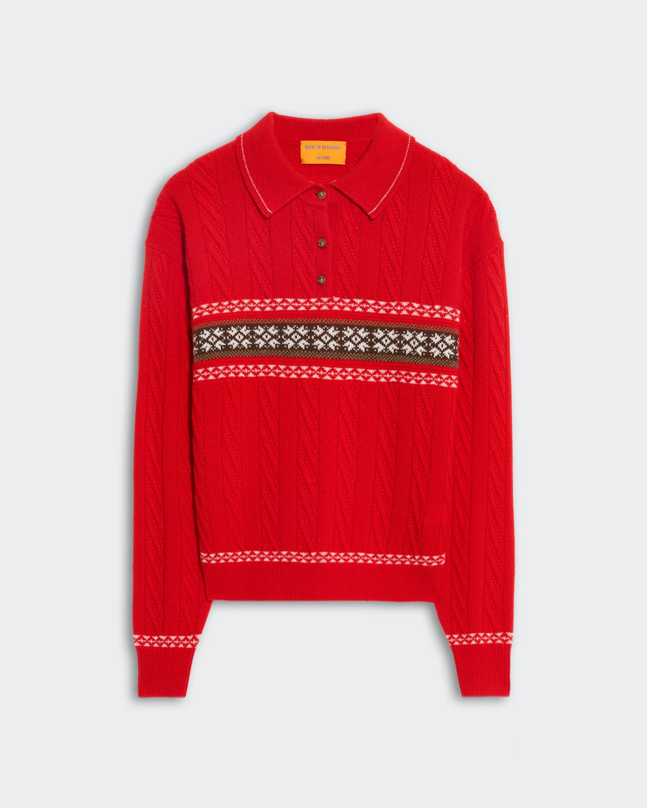Red mid-weight cable knit polo with fairisle snowflake pattern across chest and sleeve cuffs.