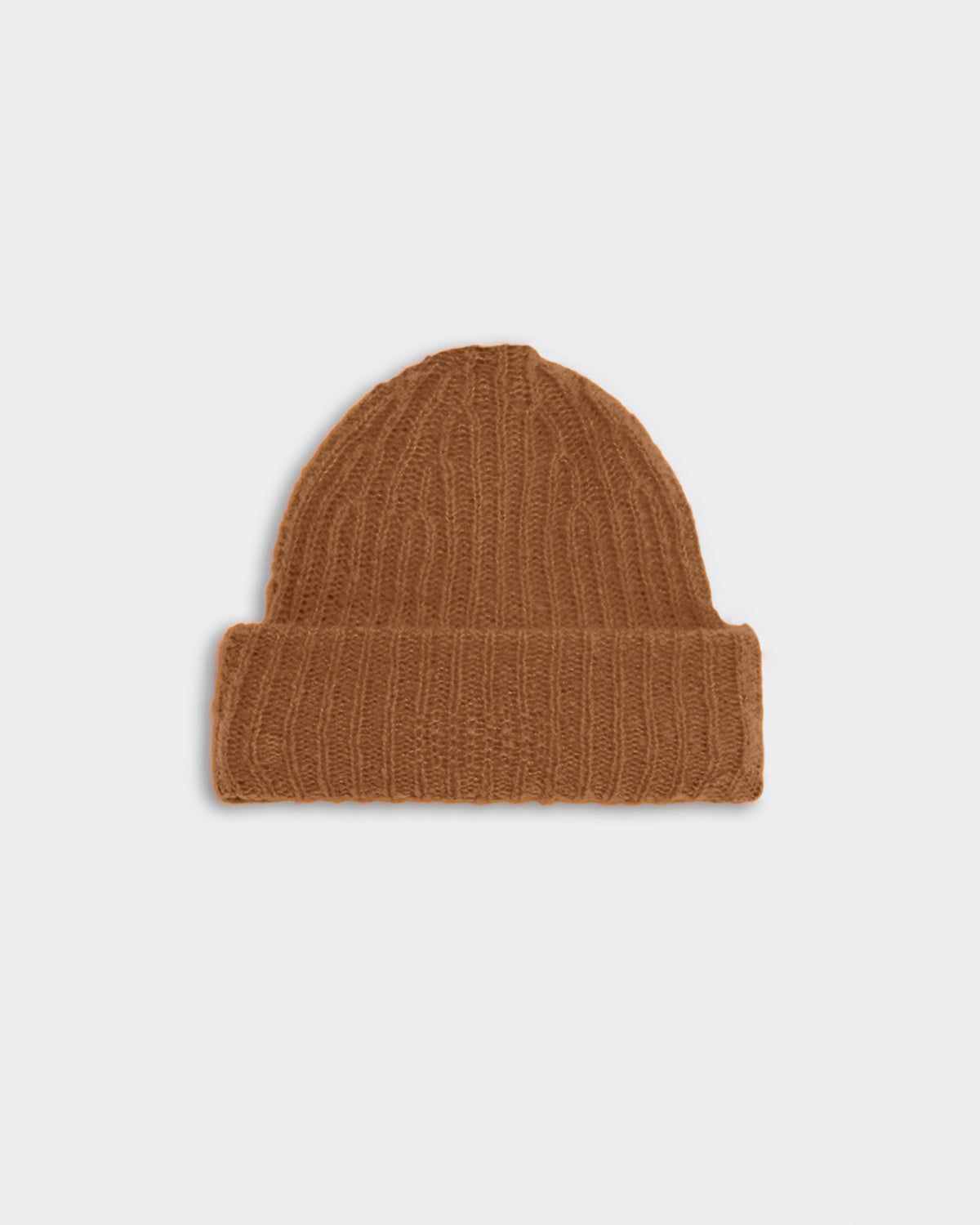 Chunky knit almond-colored rib beanie with high cuff hem made from 90% merino wool and 10% polyamide.