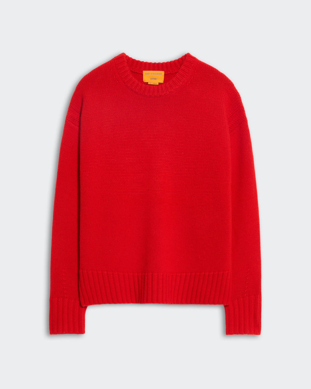 Bright red oversized women's crew neck sweater with ribbed trim and dropped shoulders, cozy and heavyweight knit design.