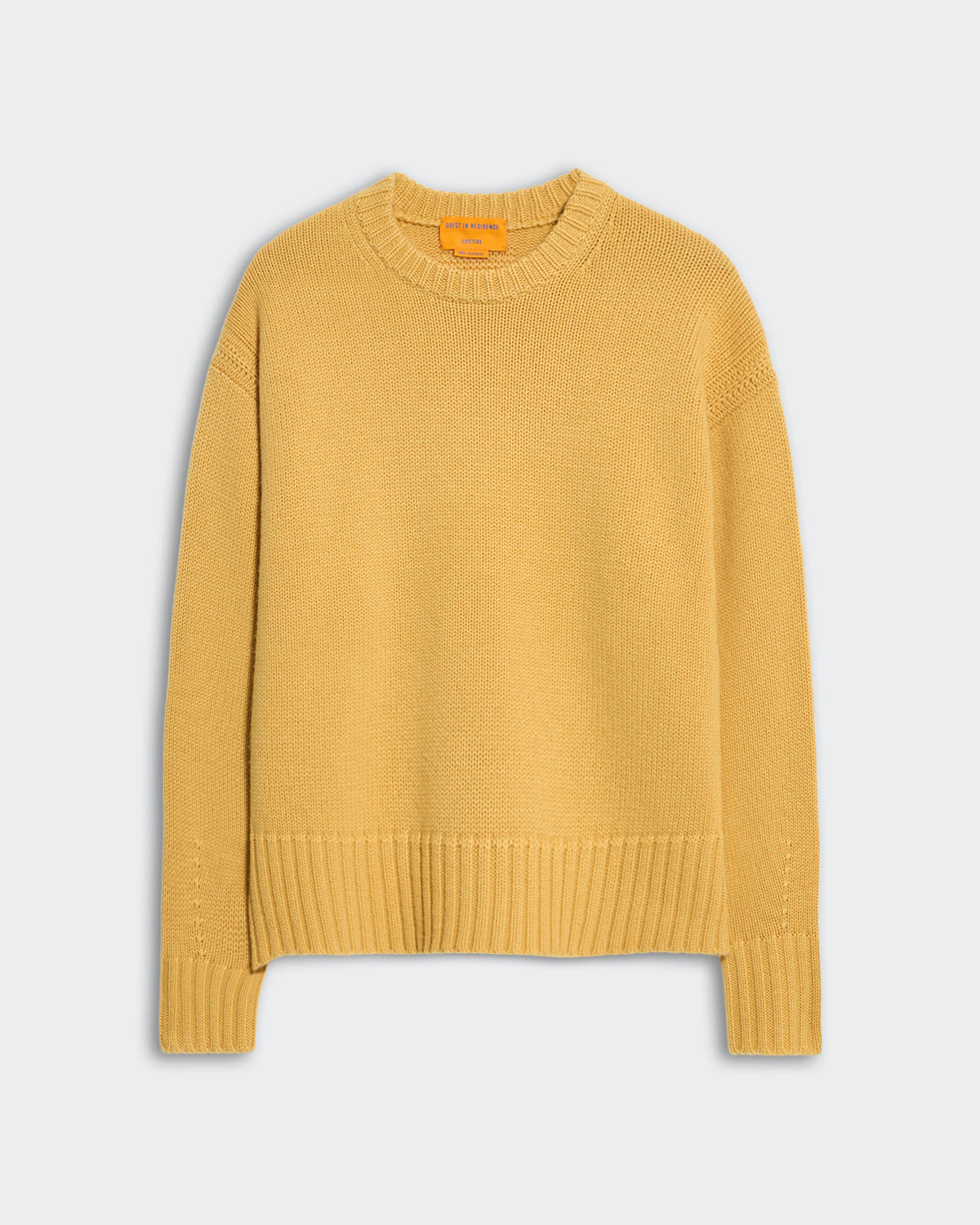 Women’s oversized cozy crew neck sweater in mustard yellow with dropped shoulder and ribbed trim details