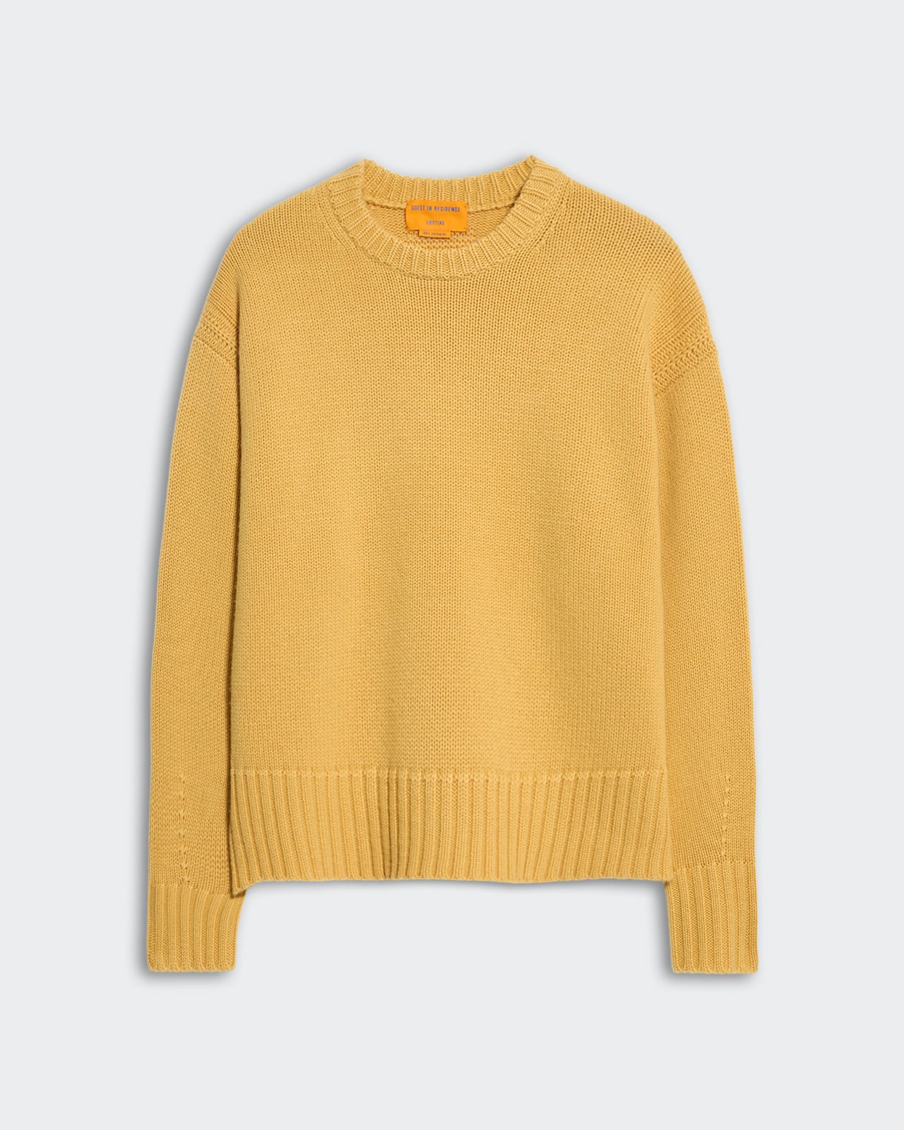 Women’s oversized cozy crew neck sweater in mustard yellow with dropped shoulder and ribbed trim details
