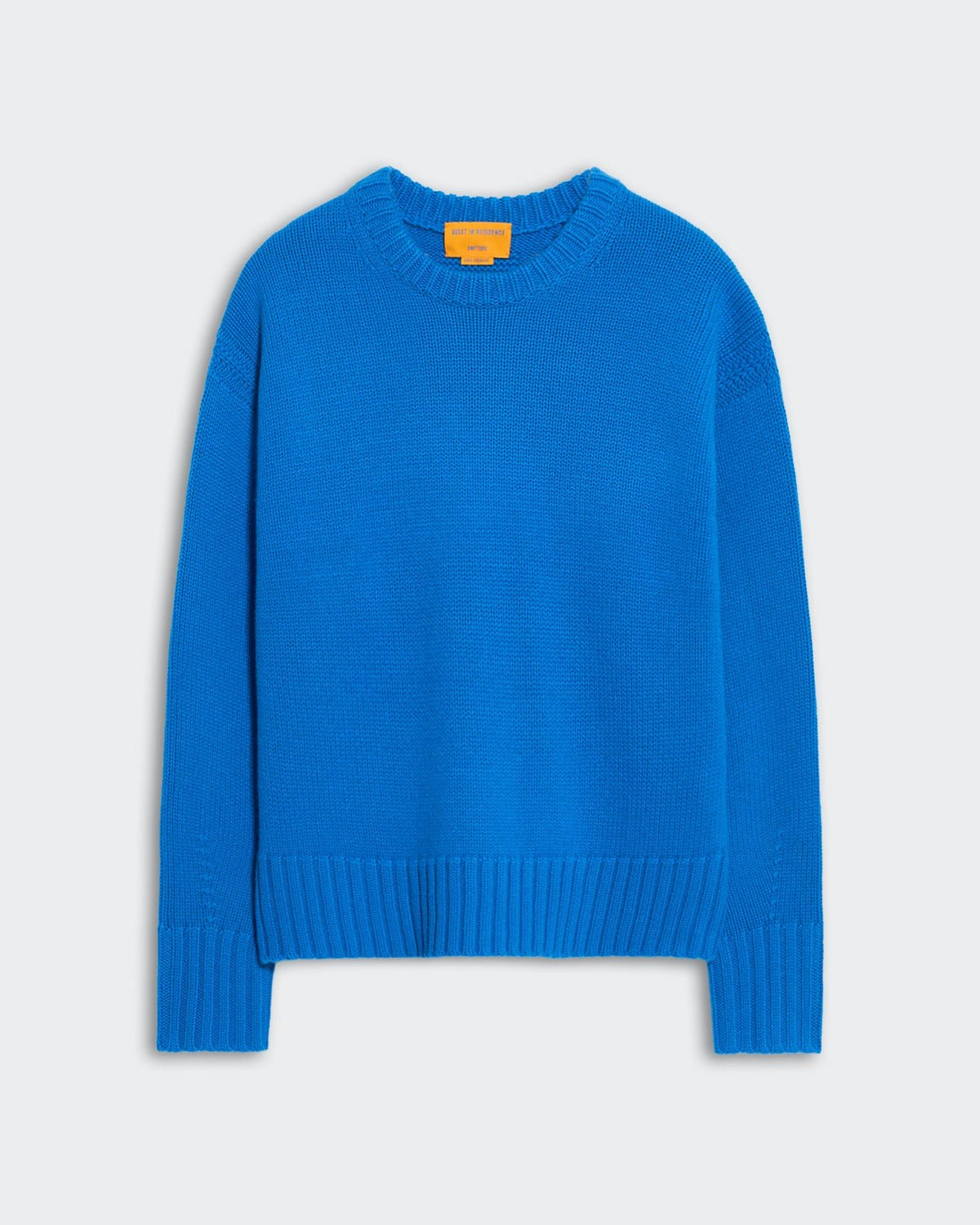 Blue oversized women's crew neck sweater with ribbed trim and dropped shoulders, Cozy Crew Twilight style.