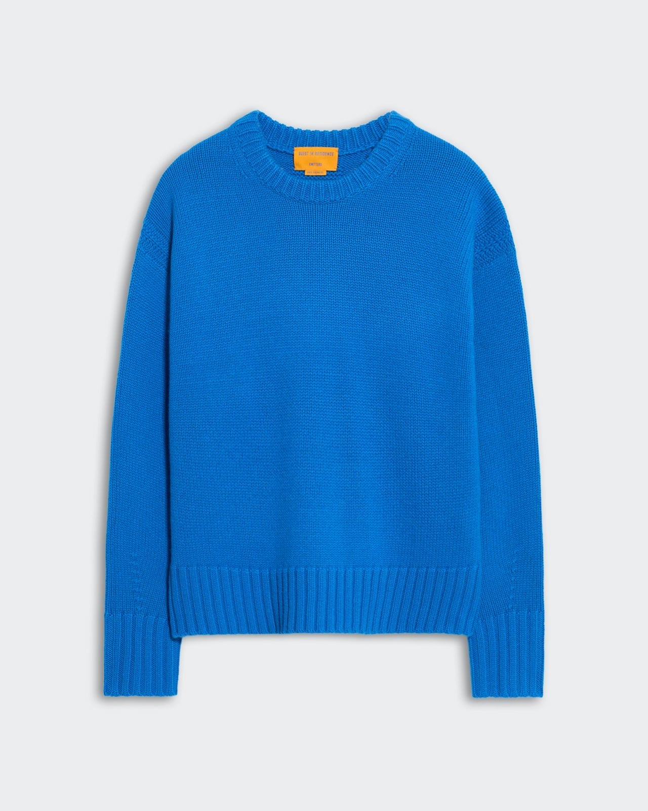 Blue oversized women's crew neck sweater with ribbed trim and dropped shoulders, Cozy Crew Twilight style.