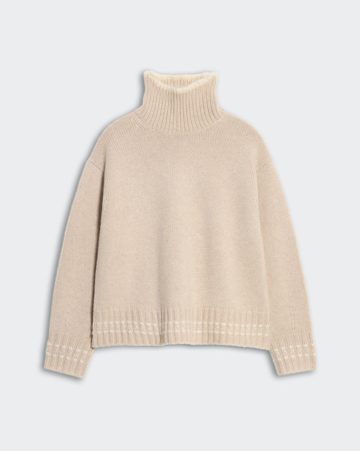 Heavy-weight cozy turtleneck sweater in sandstone cream with ribbed neck and contrast tipped hem and cuffs.