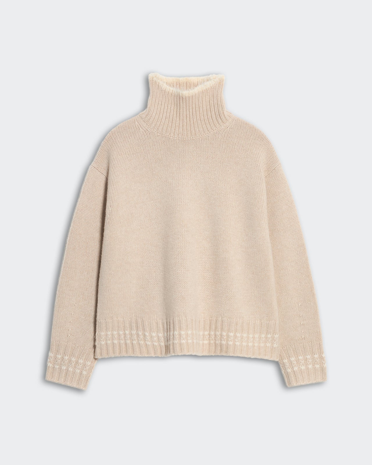 Heavy-weight cozy turtleneck sweater in sandstone cream with ribbed neck and contrast tipped hem and cuffs.