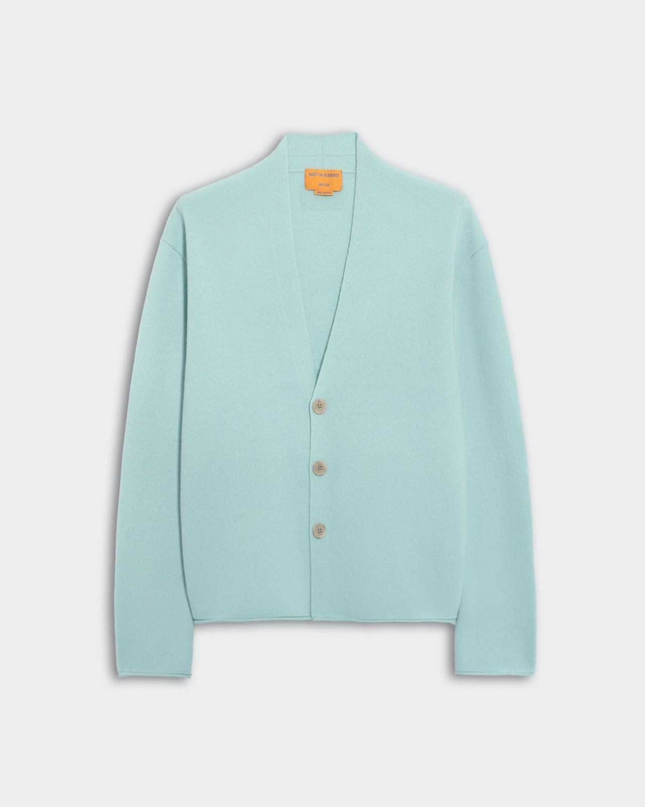 Light blue Everywear cardigan with three-button closure and shawl collar in men's sizing flat lay on white background