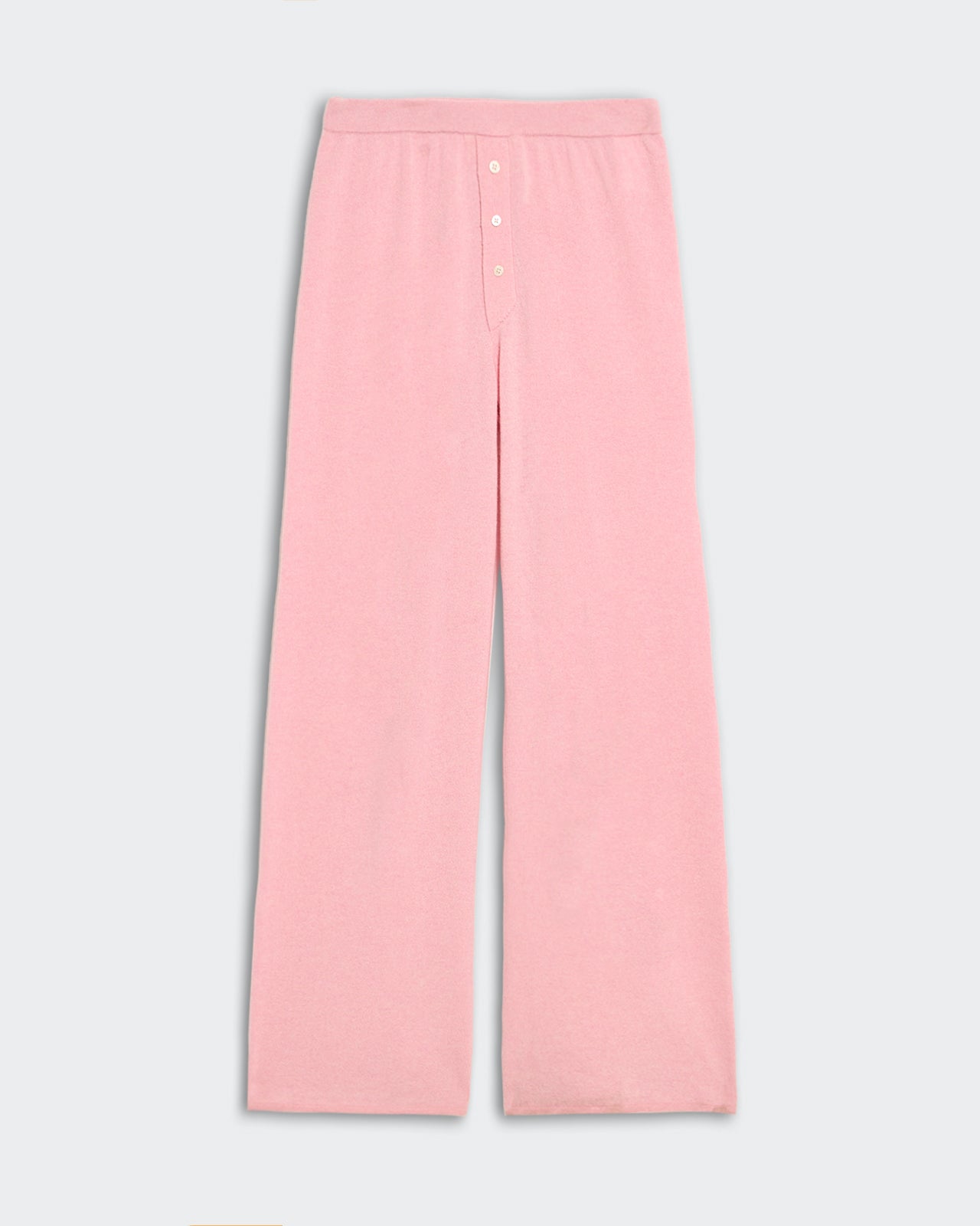 Women's relaxed fit everywear pants in pink lightweight knit with elastic waistband and button placket closure