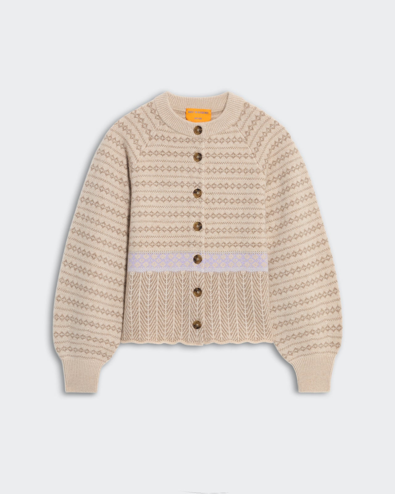 Heavyweight Fair Isle sculpted cardigan in sandstone, featuring front buttons and intricate Fair Isle hem trim.