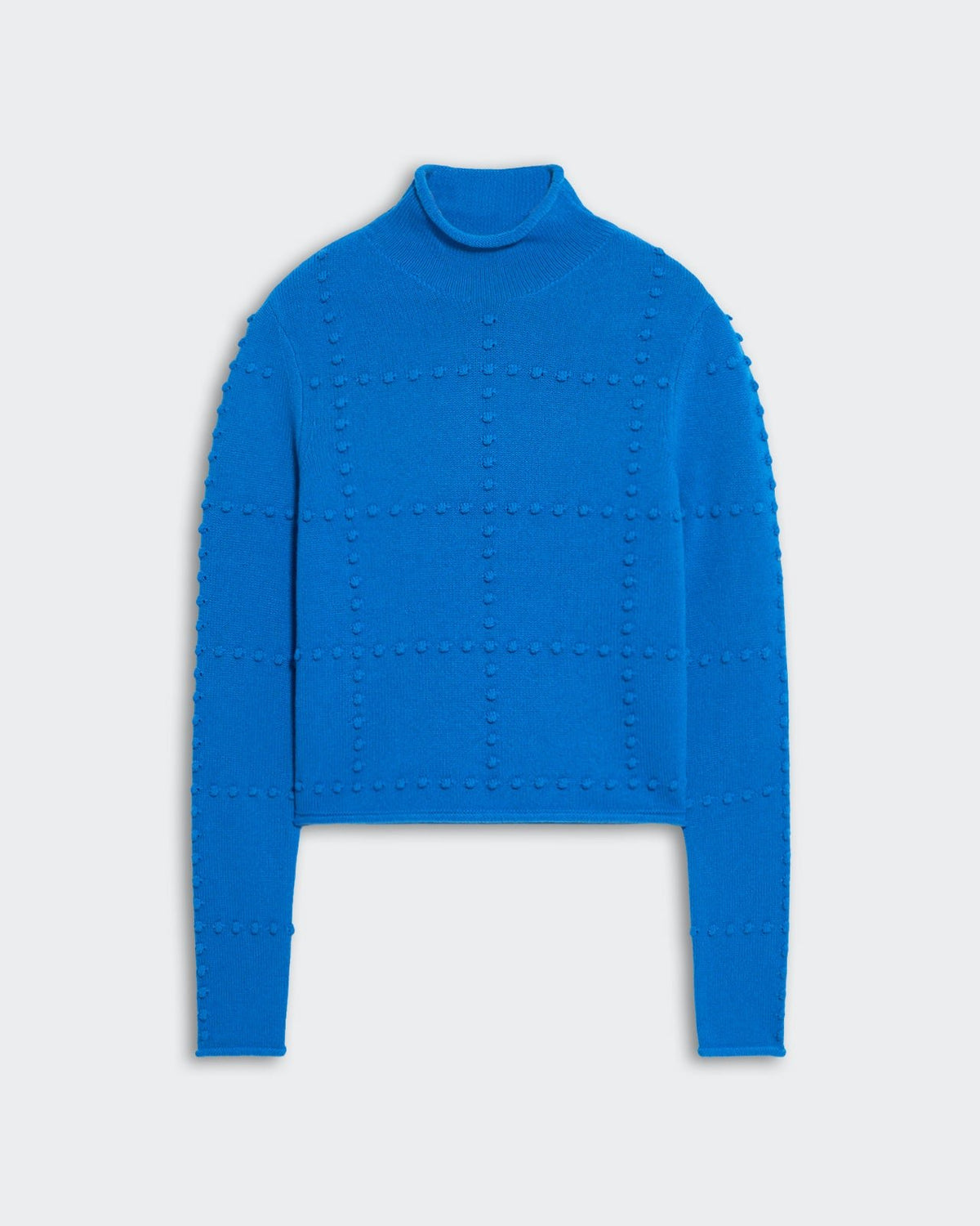 Cropped slim fit blue popcorn knit top in cashmere blend with mock neck and textured square pattern