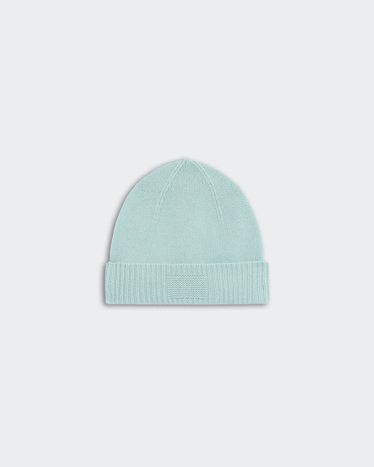 Light blue rib cuff beanie made of 100% cashmere with signature GIR branding on center cuff trim, unisex medium weight.