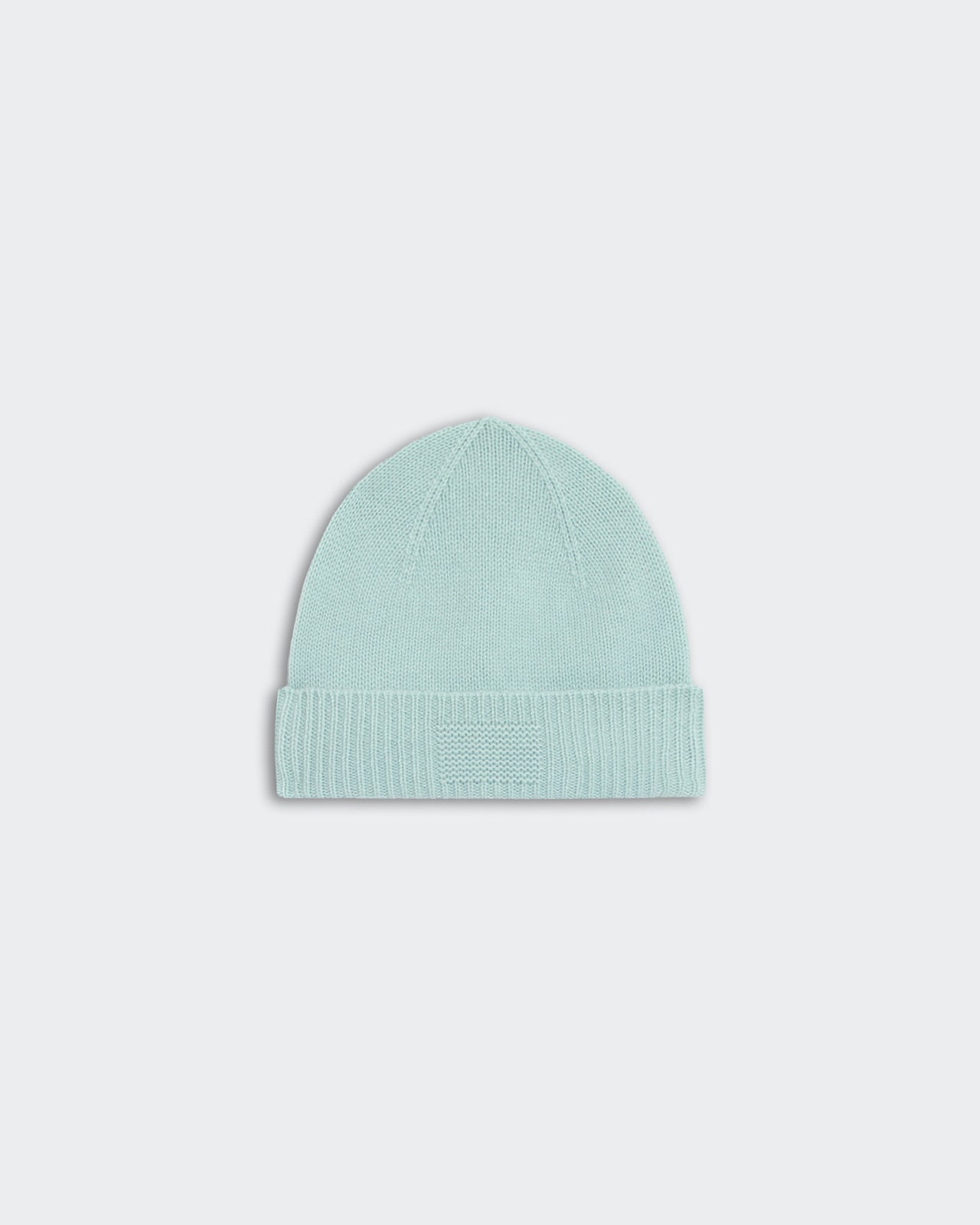 Light blue rib cuff beanie made of 100% cashmere with signature GIR branding on center cuff trim, unisex medium weight.